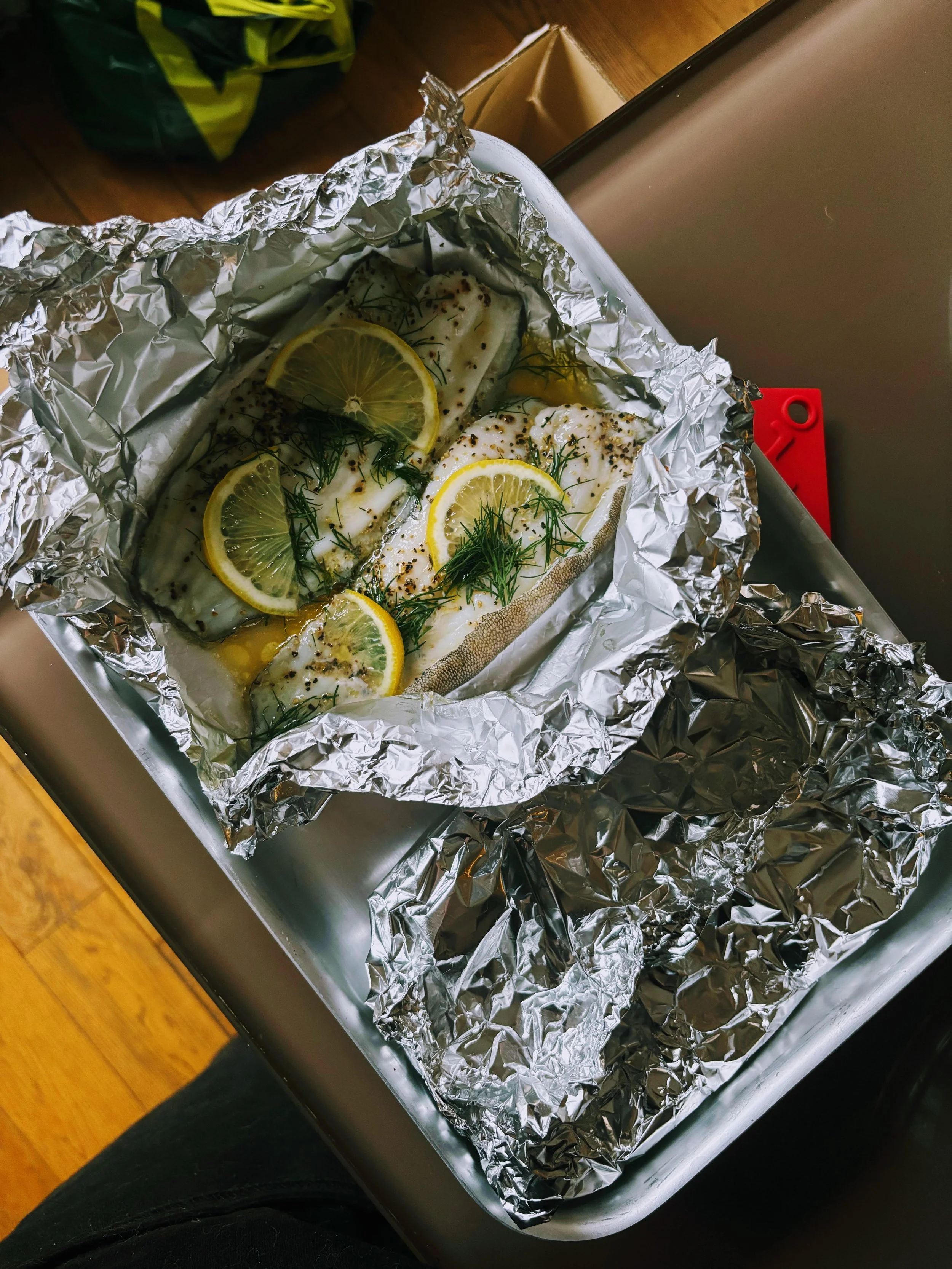 Foil-baked fish, crispy potatoes