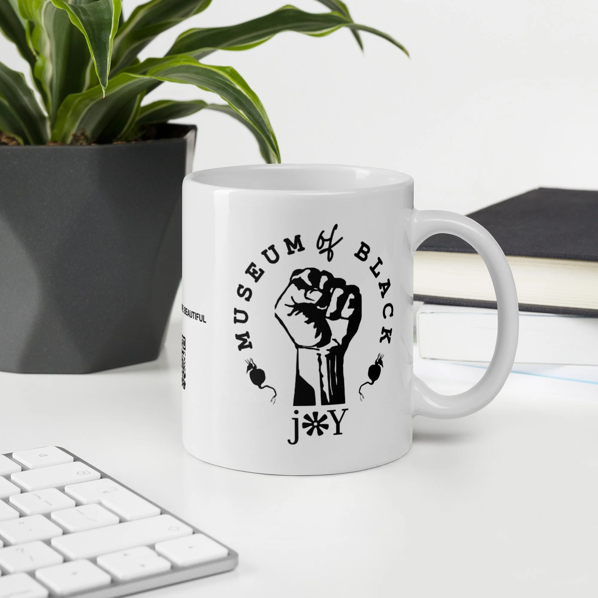 white-glossy-mug-white-11-oz-office-environment-6a23544f698f4.jpg