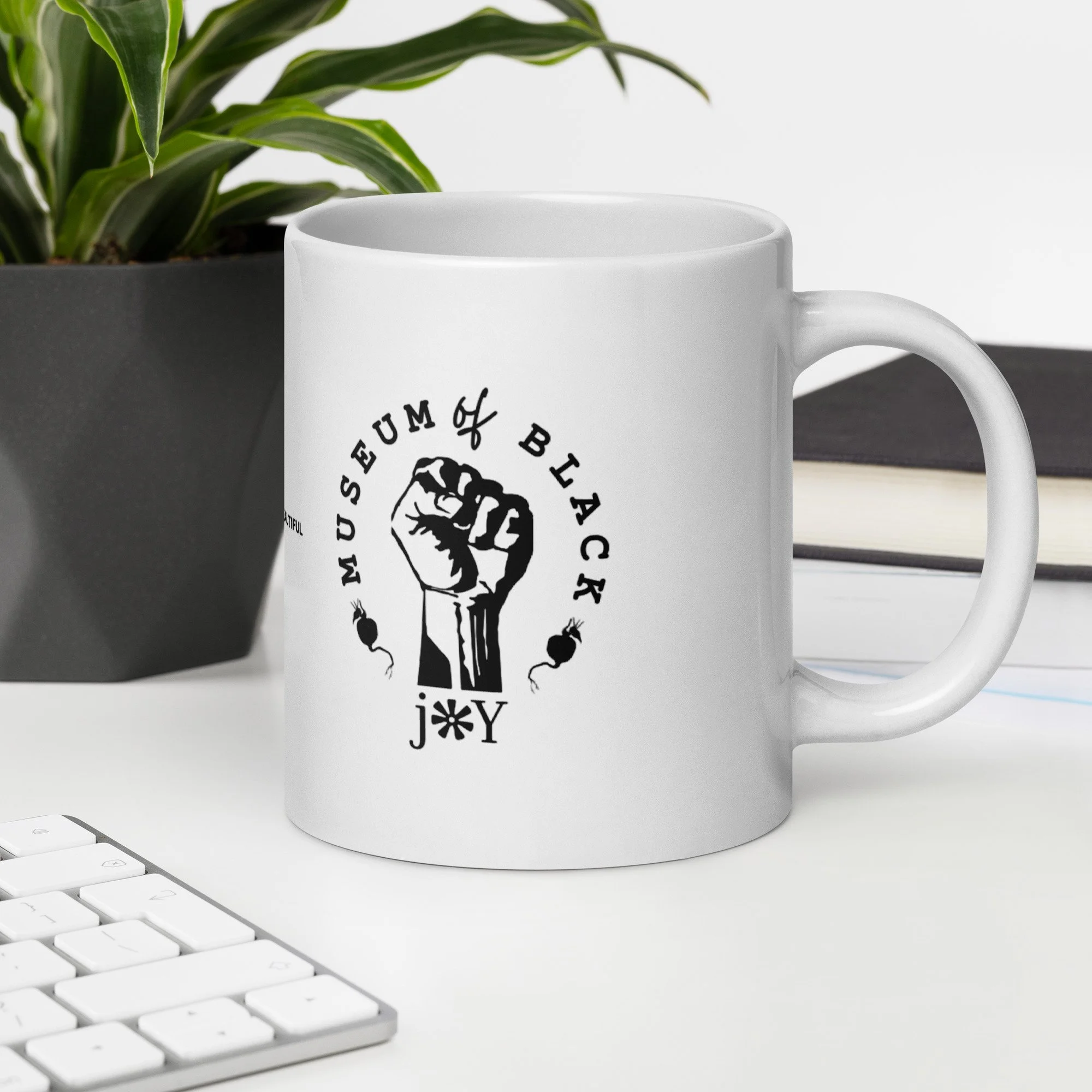 white-glossy-mug-white-20-oz-office-environment-6a23544f69e59.jpg