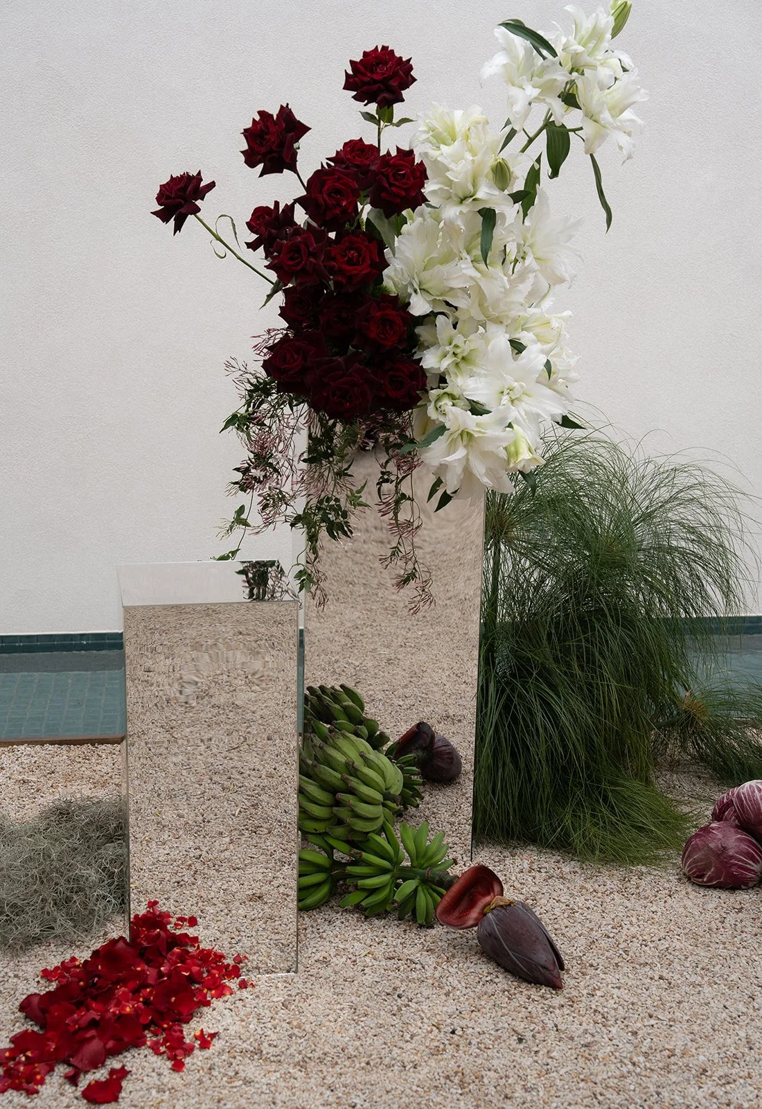 Modern wedding ceremony, chrome wedding styling, chrome plinths, modern sculptural wedding flowers, banana flower, green bananas, Ravensbourne wedding florist, Toowoomba Wedding florist, The Dairy Ravensbourne, white rose lilies, modern wedding cerem