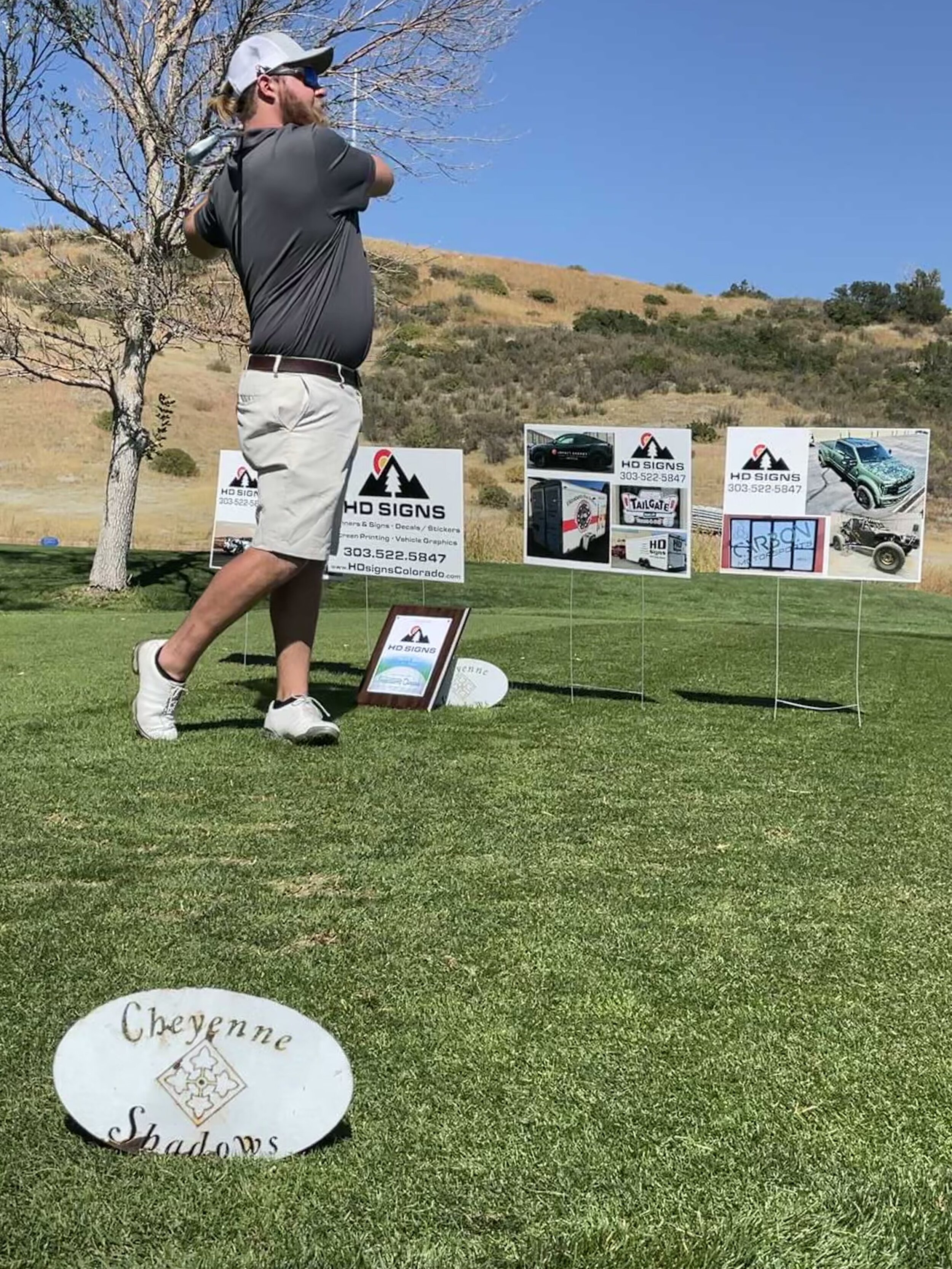 Max golfing Cheyenne shadows.jpg