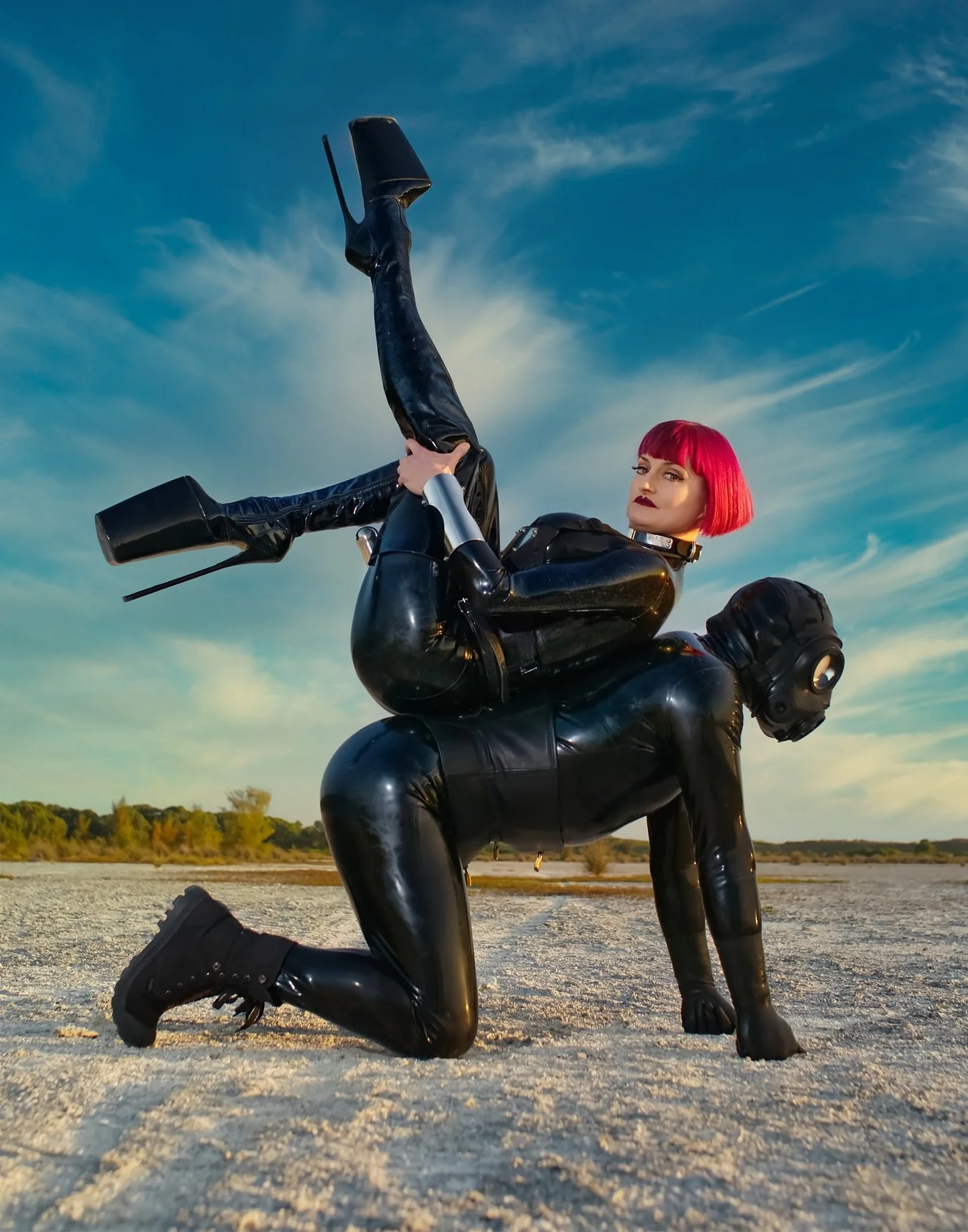 Mistress Tokyo and firefly by @warped.photography ! I&rsquo;m wearing a #megaboobs #latex #Catsuit , patent  #leather tightlacing #corset by @sue_nice , stainless steel strap by @demask_berlin vintage 12 inch heel 7 inch platform patent leather boots