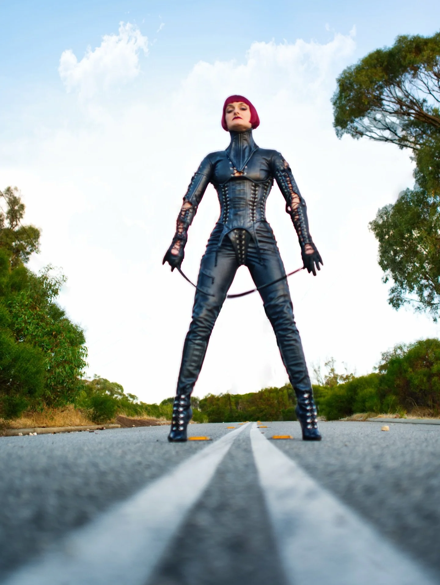 Social media rebuild! Mistress Tokyo in full #leather shot by @warped.photography . I&rsquo;m wearing a #catsuit by @crazyoutfitsshop , #boots by Leatherworks, lace on leather panties by @demask_officialpage and a random #corset thanks to German EBay