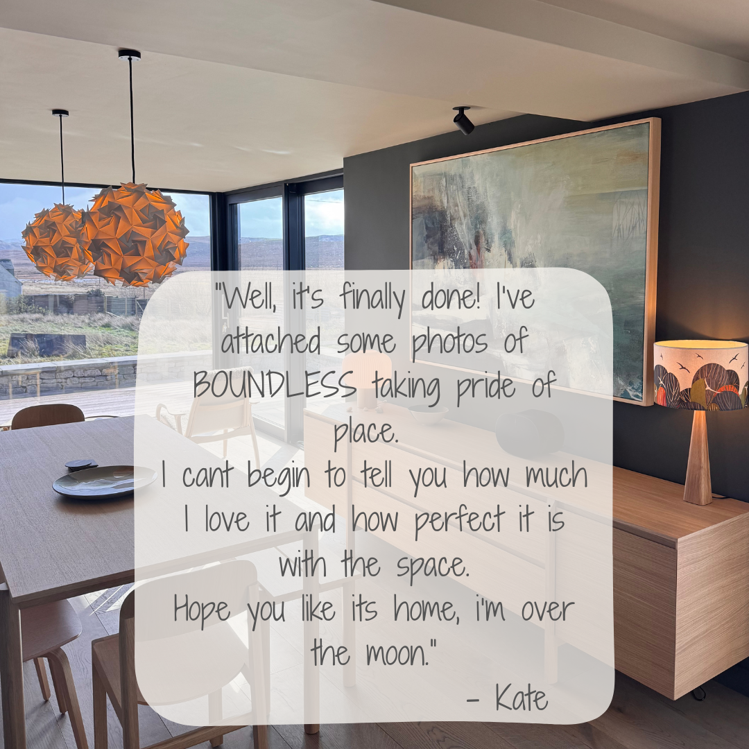 Large abstract seascape on a dark wall in a modern dining room with views out to the countryside