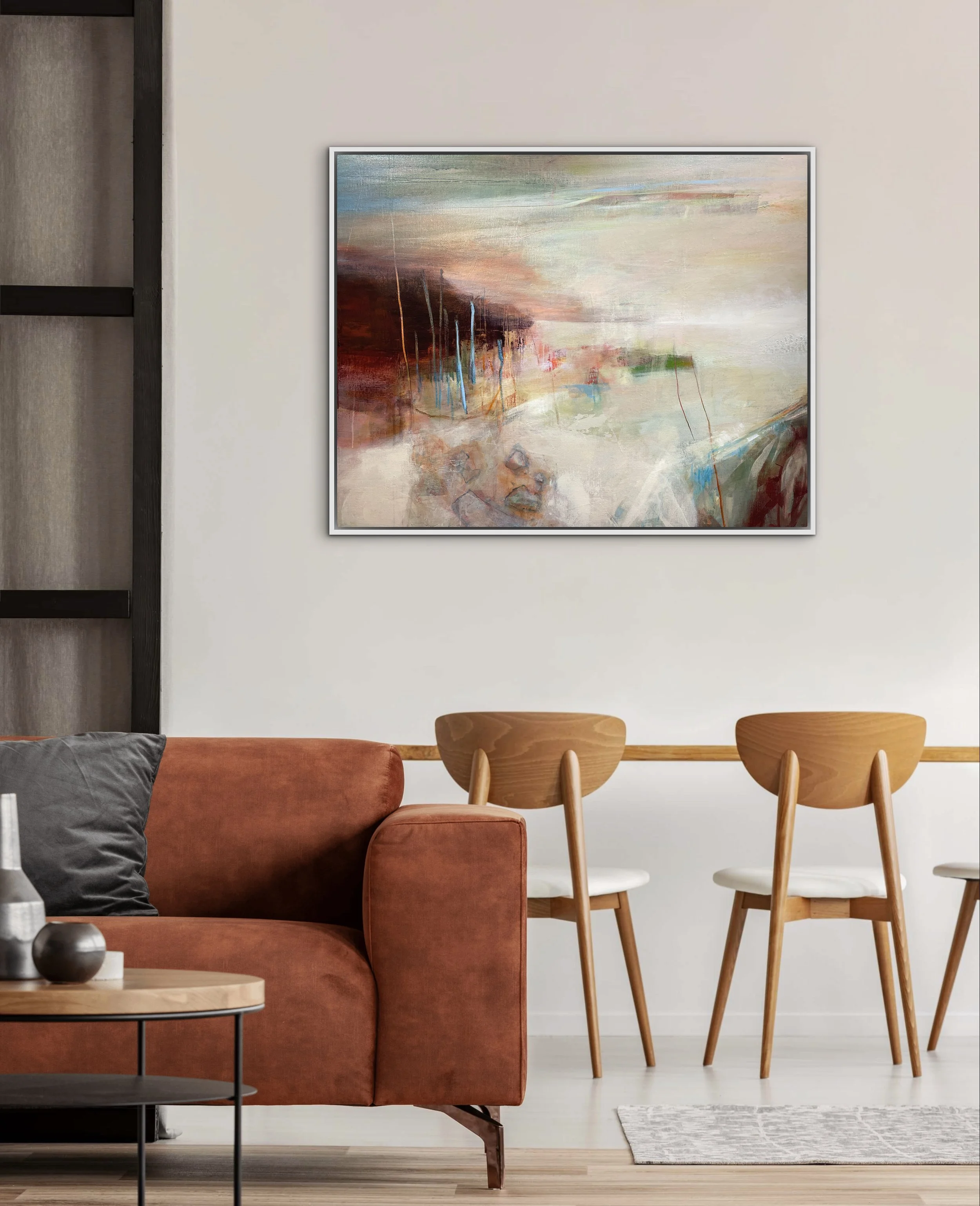 Large moody abstract landscape hung on pale grey wall