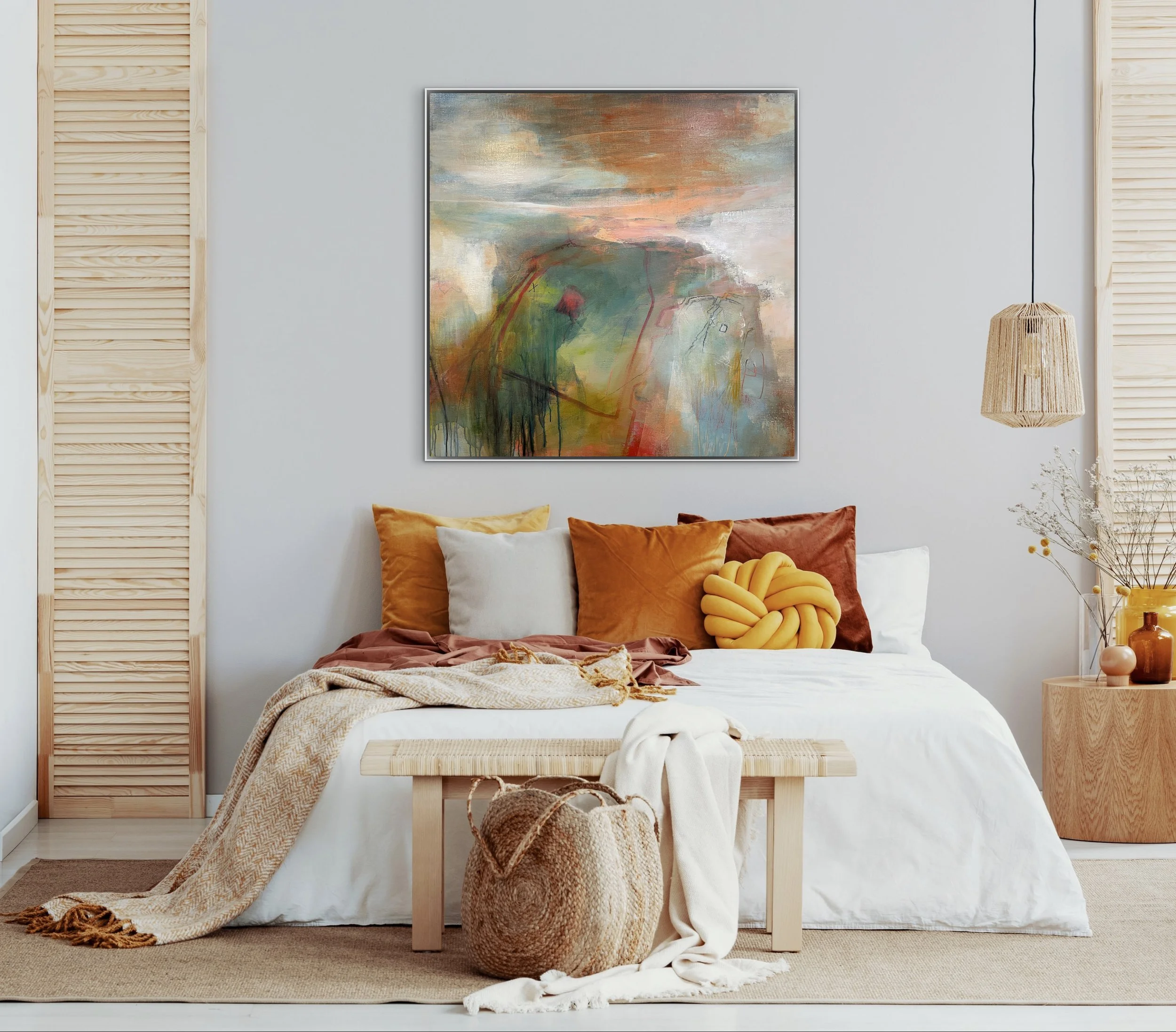 Large blue and orange abstract landscape hung on light grey wall