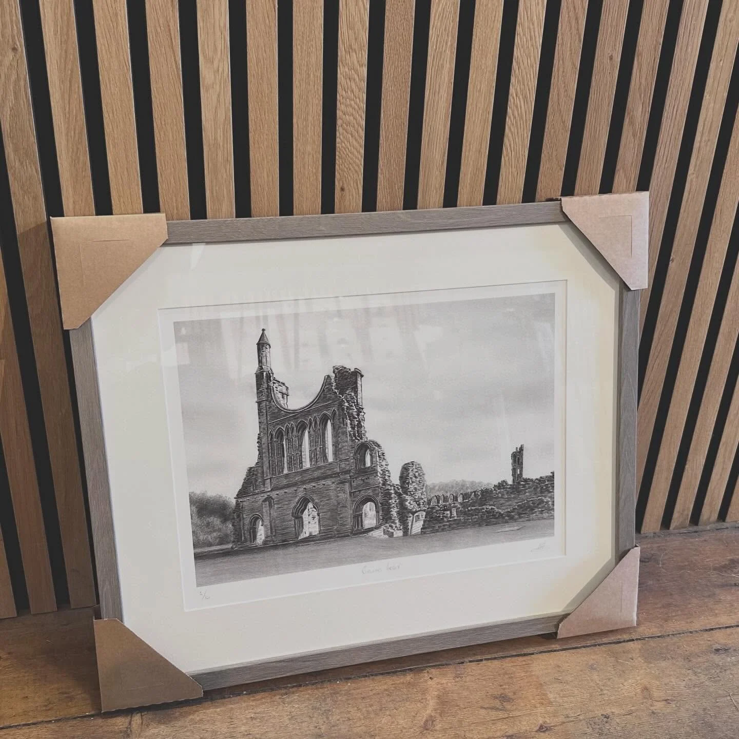 Byland Abbey limited edition print framed in a light walnut moulding. The original of this is currently available from the Helmsley gallery.