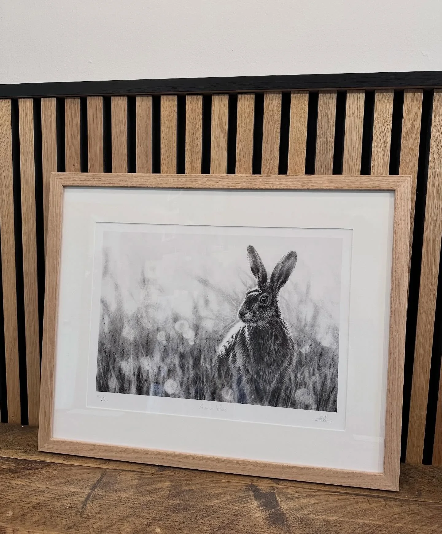 &lsquo;Autumn Hare&rsquo; limited edition print framed in oak.