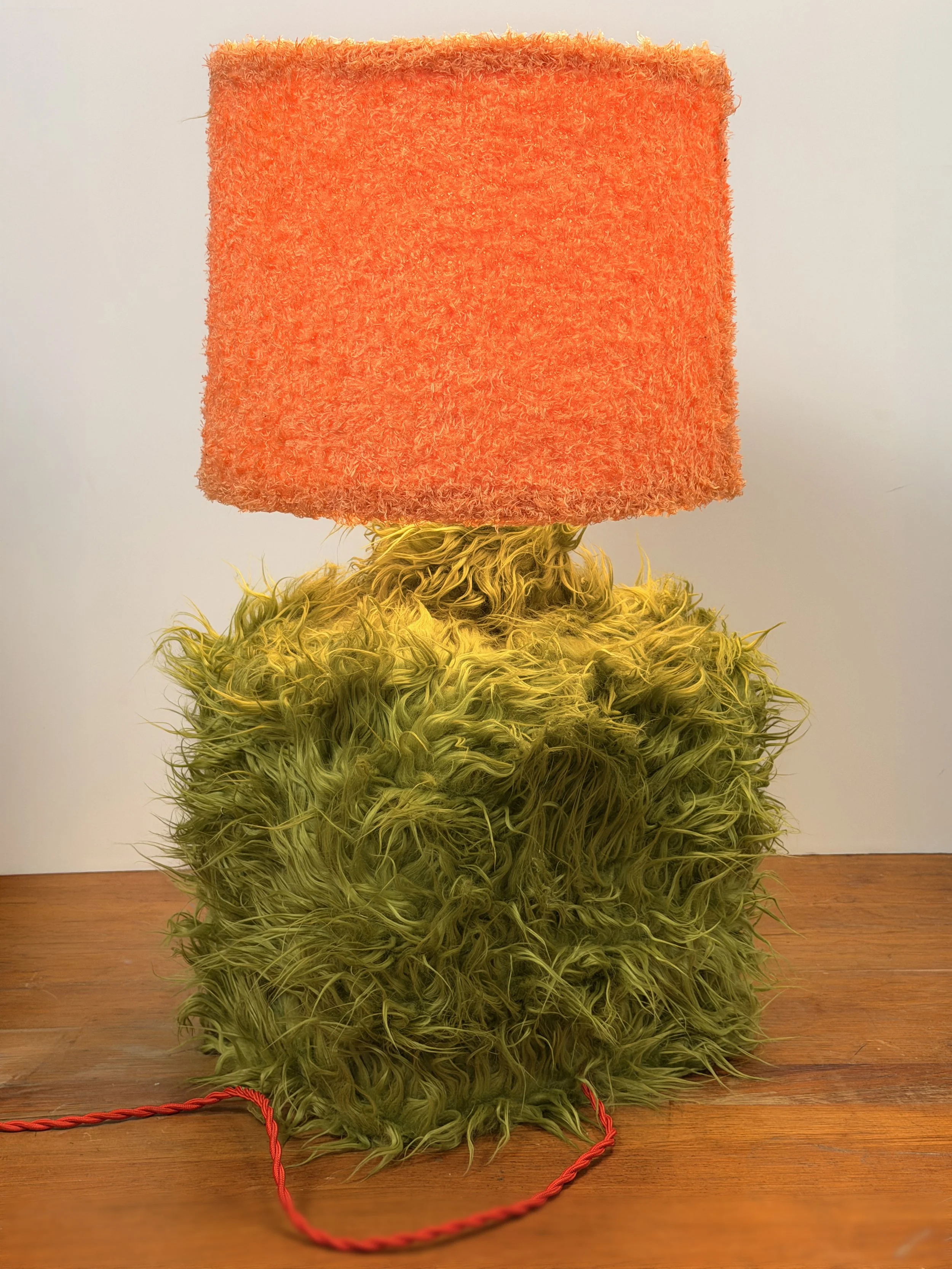 onesy T., handmade werewolf character lamp with green and orange fur, by Barak Hardley