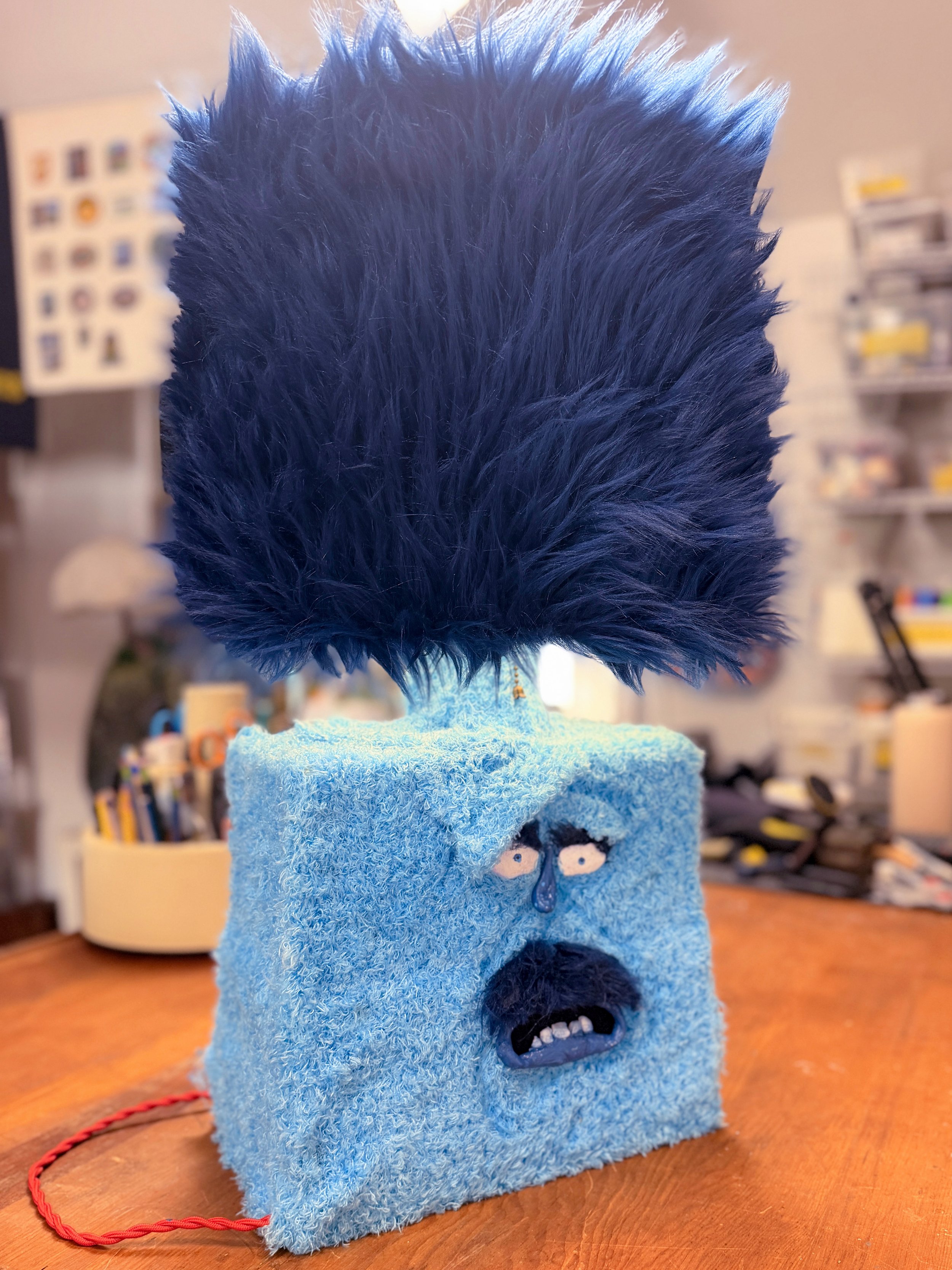 Teddy Bees, handmade lamp with blue shaggy fur and sculpted face, by Barak Hardley