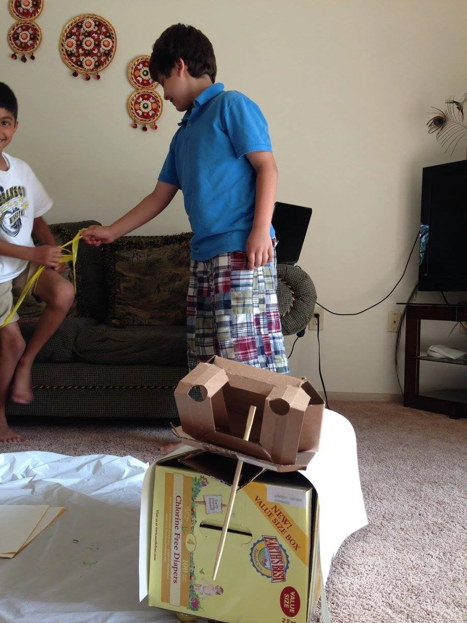 Prep for Puppet show, Earth day-2015, with recycled boxes and papers