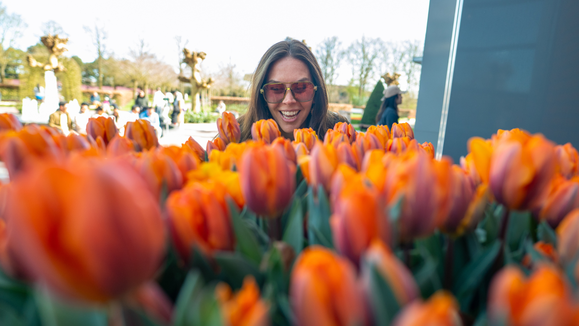 Huffman Travel Image of Begin Your European River Journey AmaWaterways - lady smelling tulips