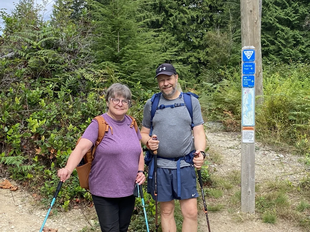 Maureen and Harry on the Old Buntzen Lake Trail by Ramona