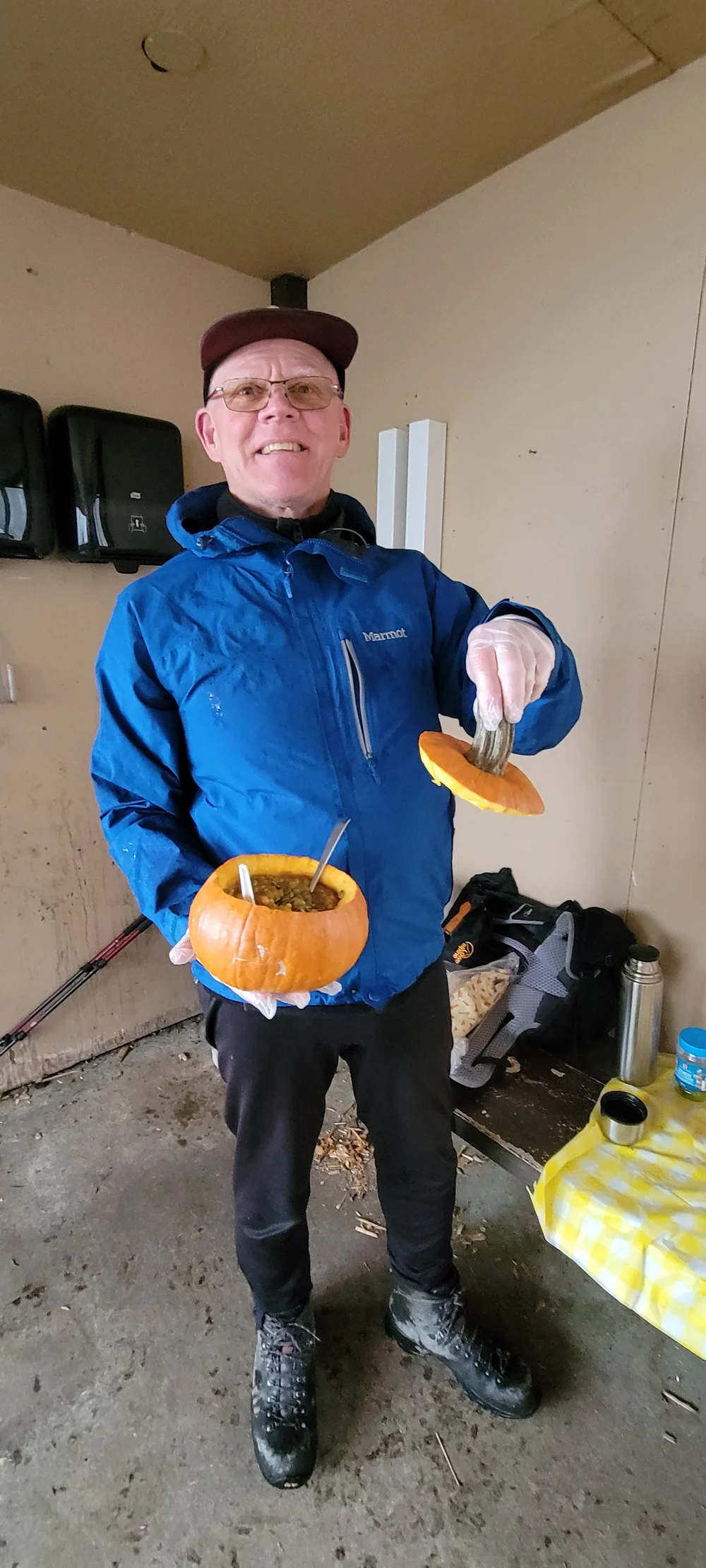 Dave with his amazing stew in the pumpkin bowl – still warm despite the cold weather Image by Rob