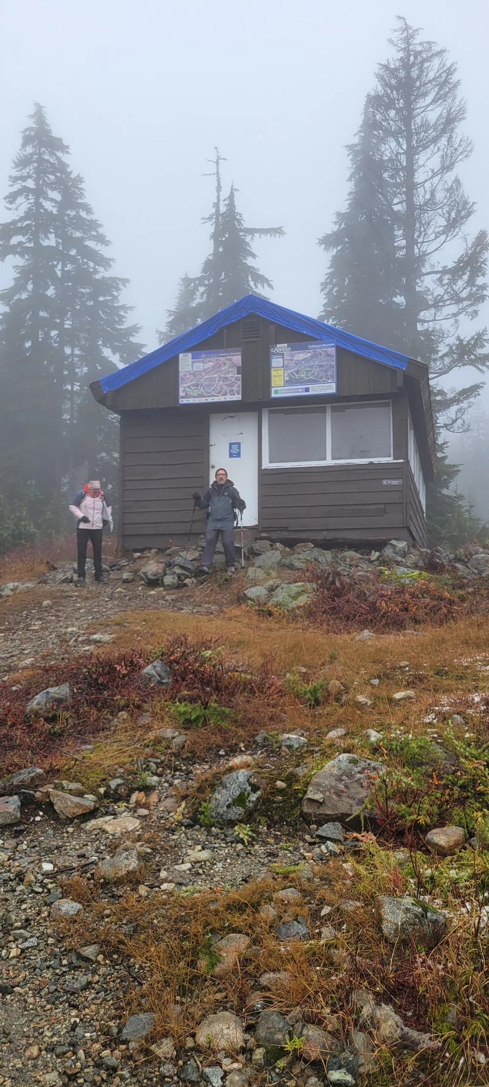  Hut in the fog, as we were leaving.  Roof under repair. Image by Rob