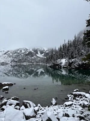 Calm Lake and Brooding Sky by Jen