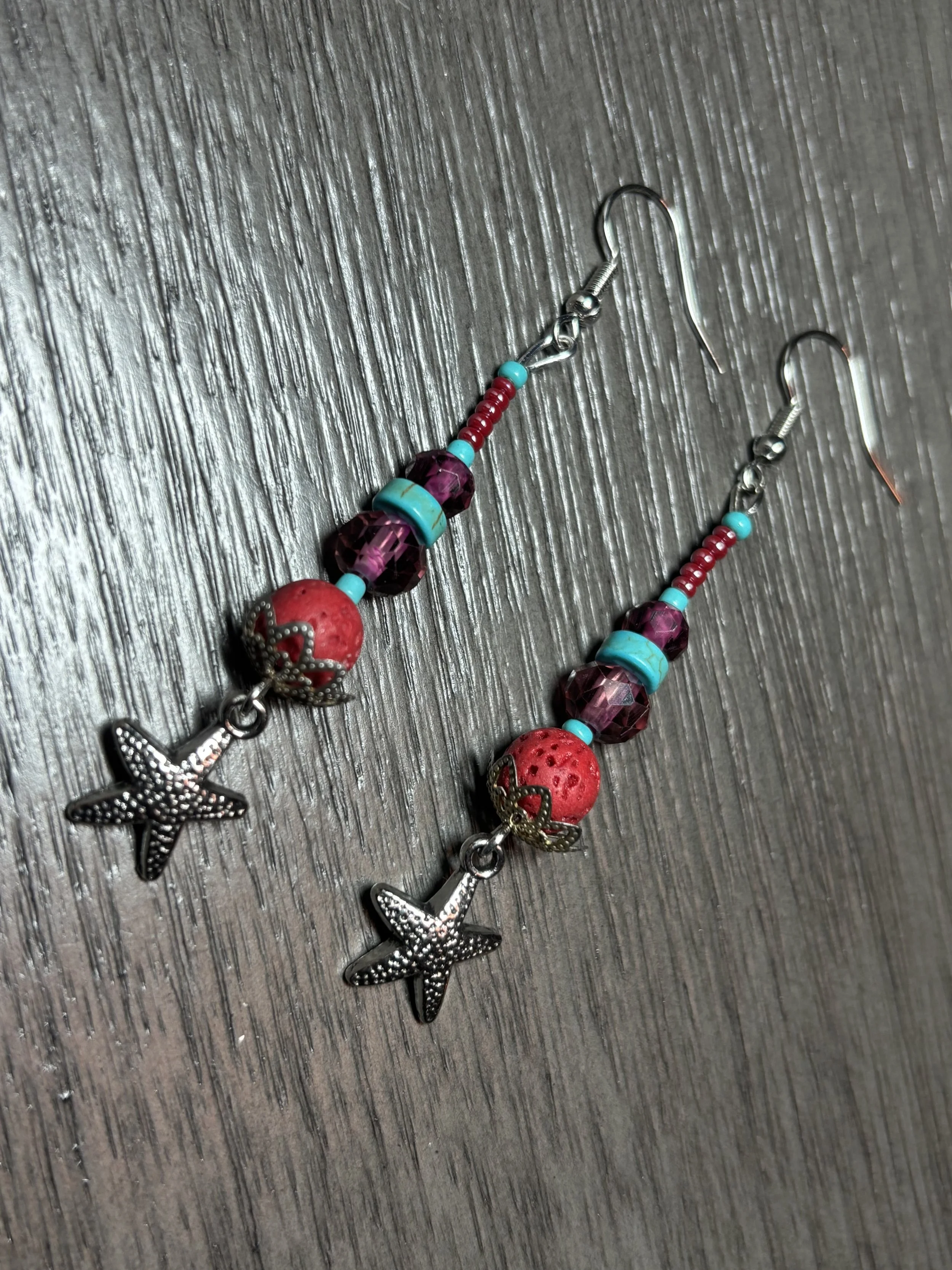 Red charcoal and turquoise starfish pendant beaded earrings