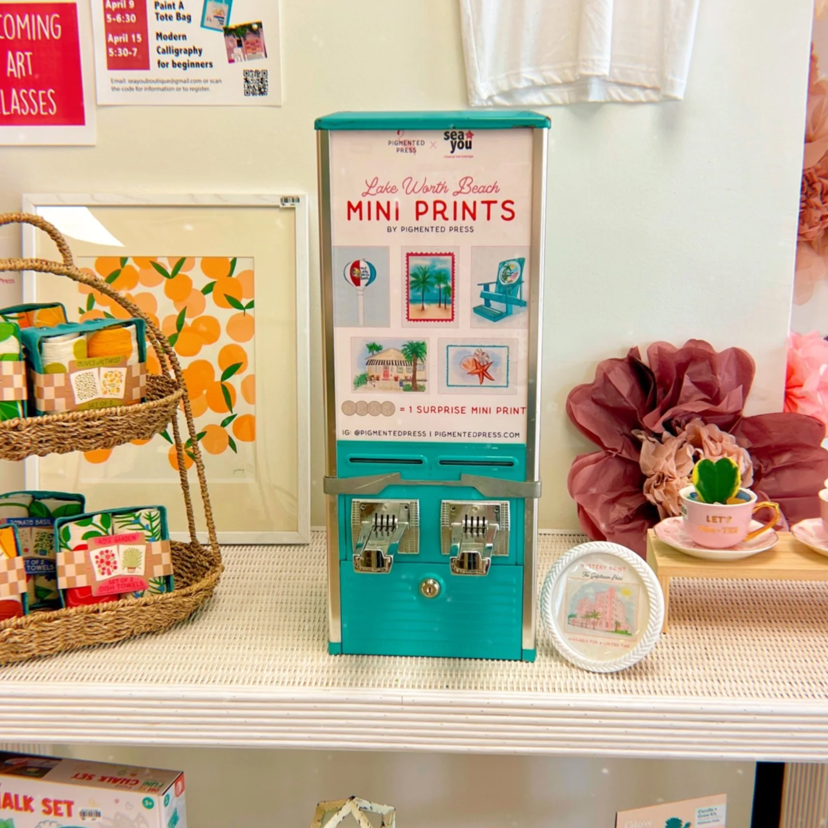 blue vending machine with beach themed prints