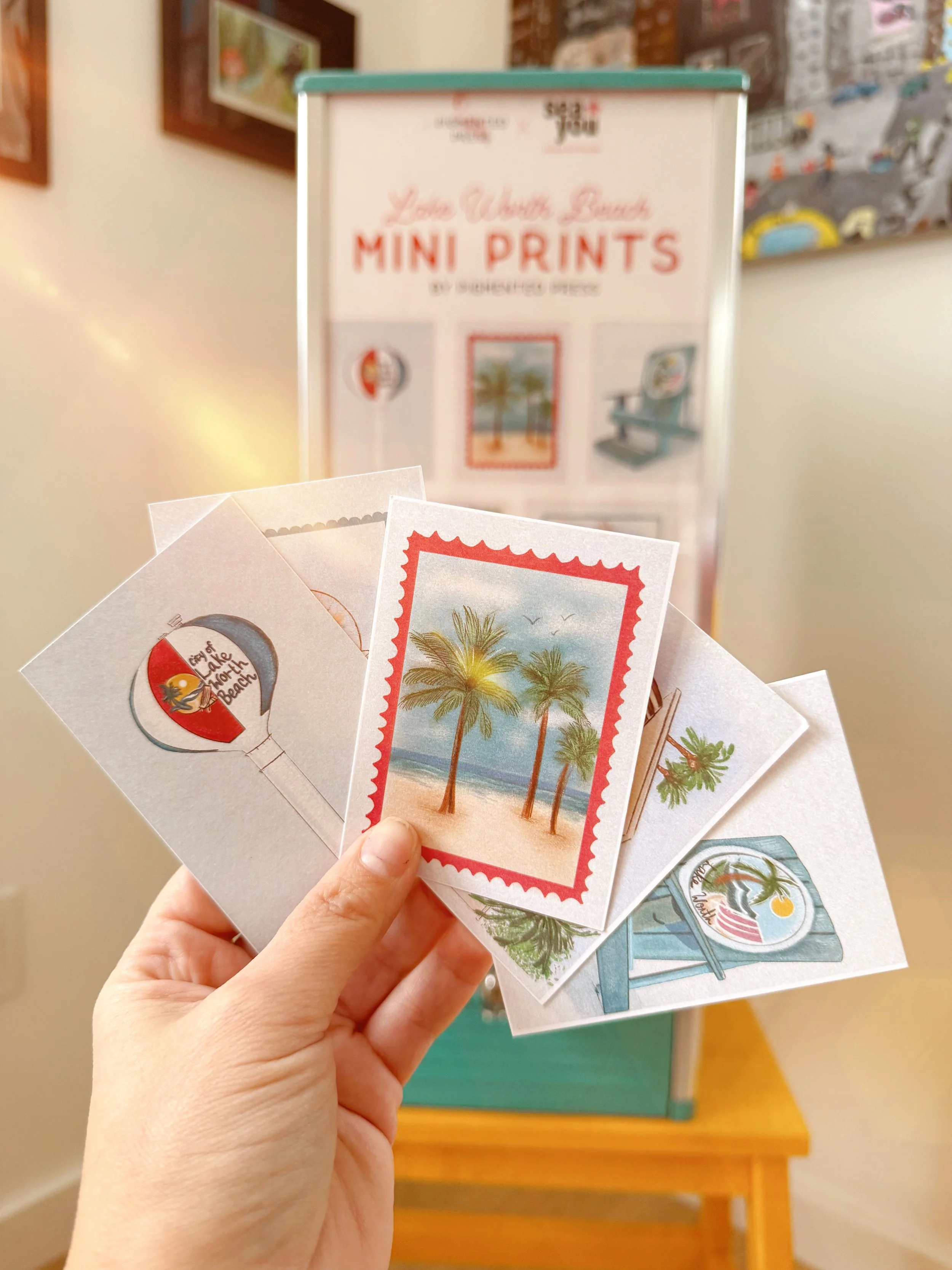 blue vending machine with beach themed prints