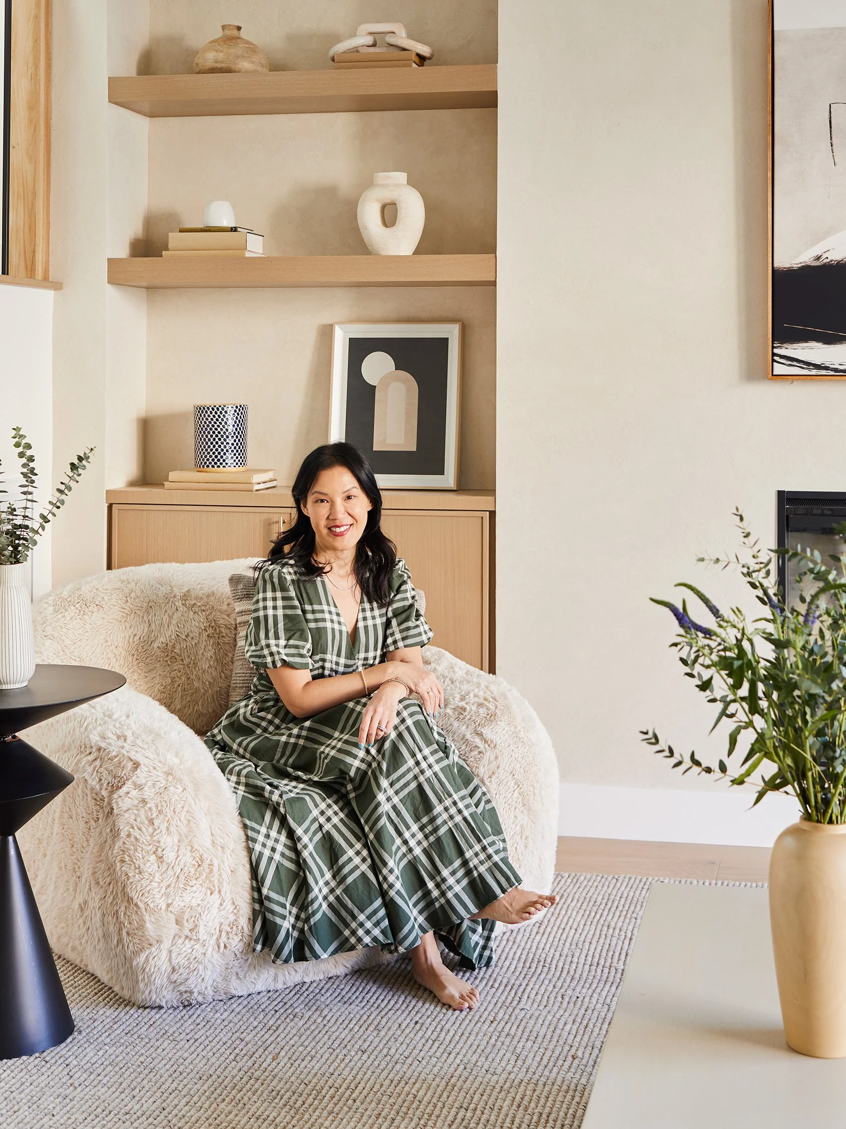 Interior Designer and Licensed Therapist Anita Yokota seated and smiling