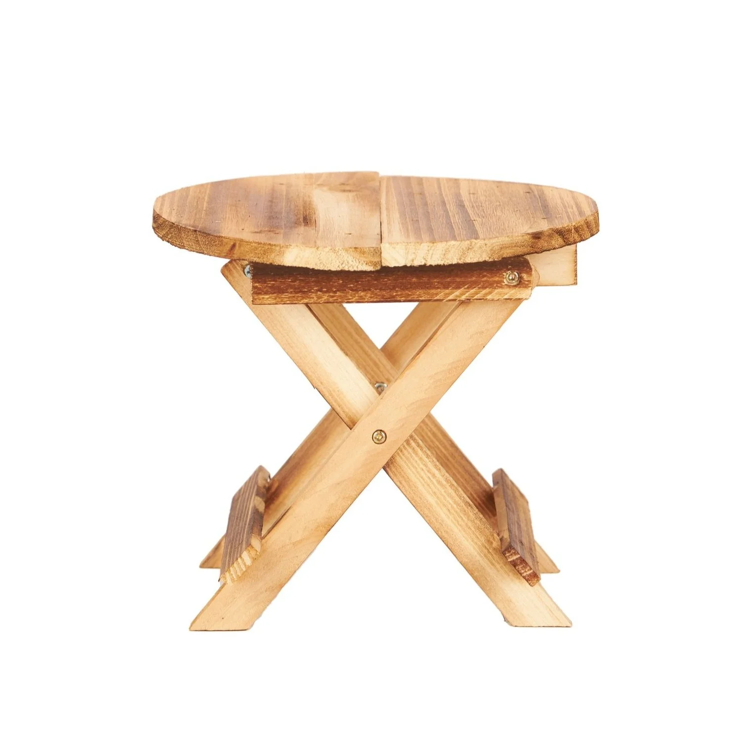 Wooden folding stool with crossed legs and round top against a white background.