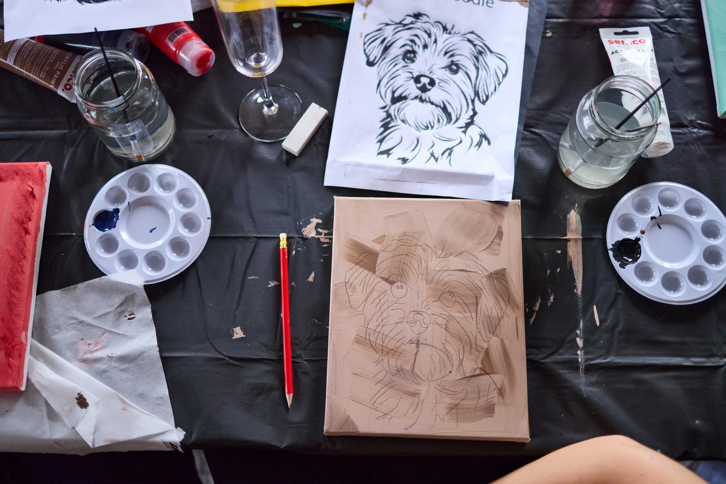 Painting supplies laid out for a pet portrait workshop at The Dale Studio, Chippendale, Sydney.