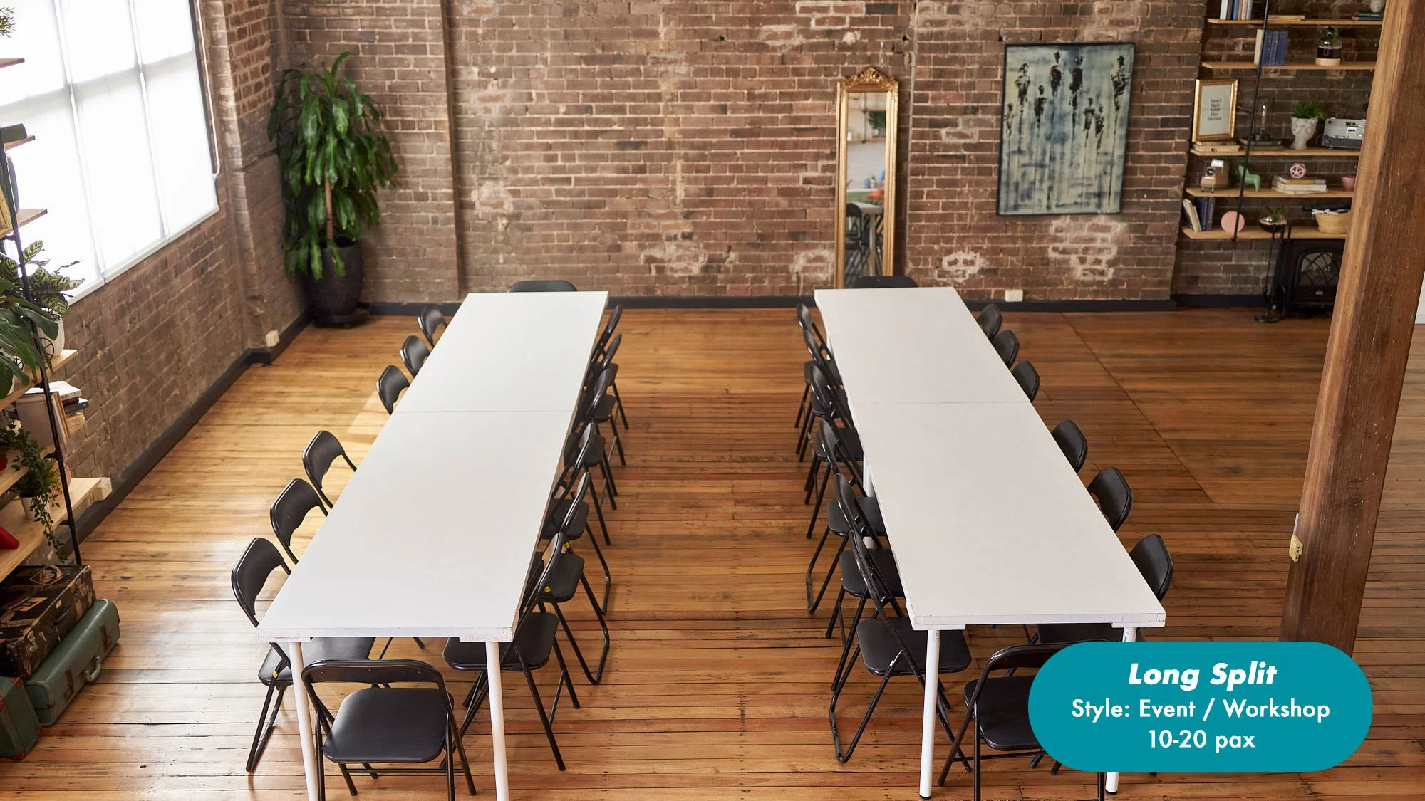 Industrial brick-walled event space with two long white tables and black folding chairs for a 10–20-person workshop at the Dale Studio in Chippendale. 