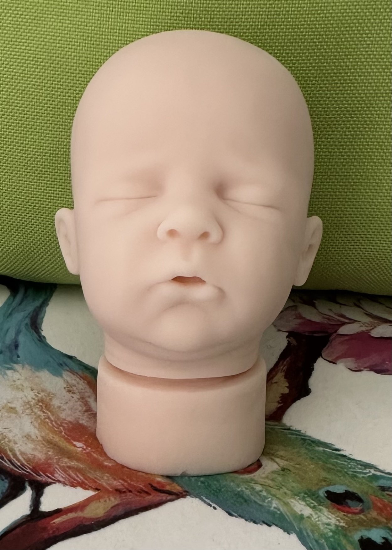 Romeo Silicone Cuddle head sculpted by Severine Piret Mercier with optional extra cuddle cloth body