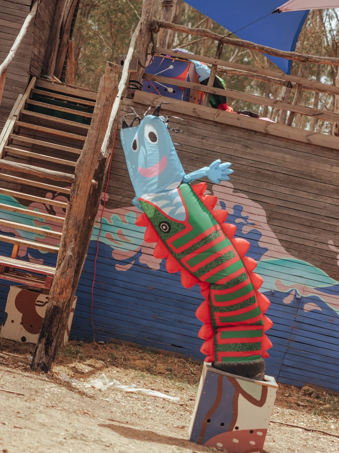 This is Snax. Snax is being devoured by the Cosmic Serpent, but he&rsquo;s enjoying it anyway. Be more like Snax. Swipe to see his dance moves 🕺🏽😁🐍 Snax is part of the kooky inflatable sculpture family I designed for @strawberryfields_festival &l