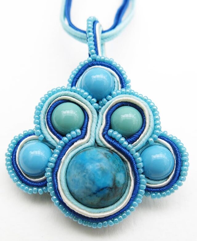 On such a beautiful day here's a pendant with all the colours of the sea! It's made with Swarovski Pearls and the centre gemstone is Chryscolla which is meant to&nbsp;calm, cleanse &amp; re-energise all the chakras #friday #summer #sunny #sea #seablu