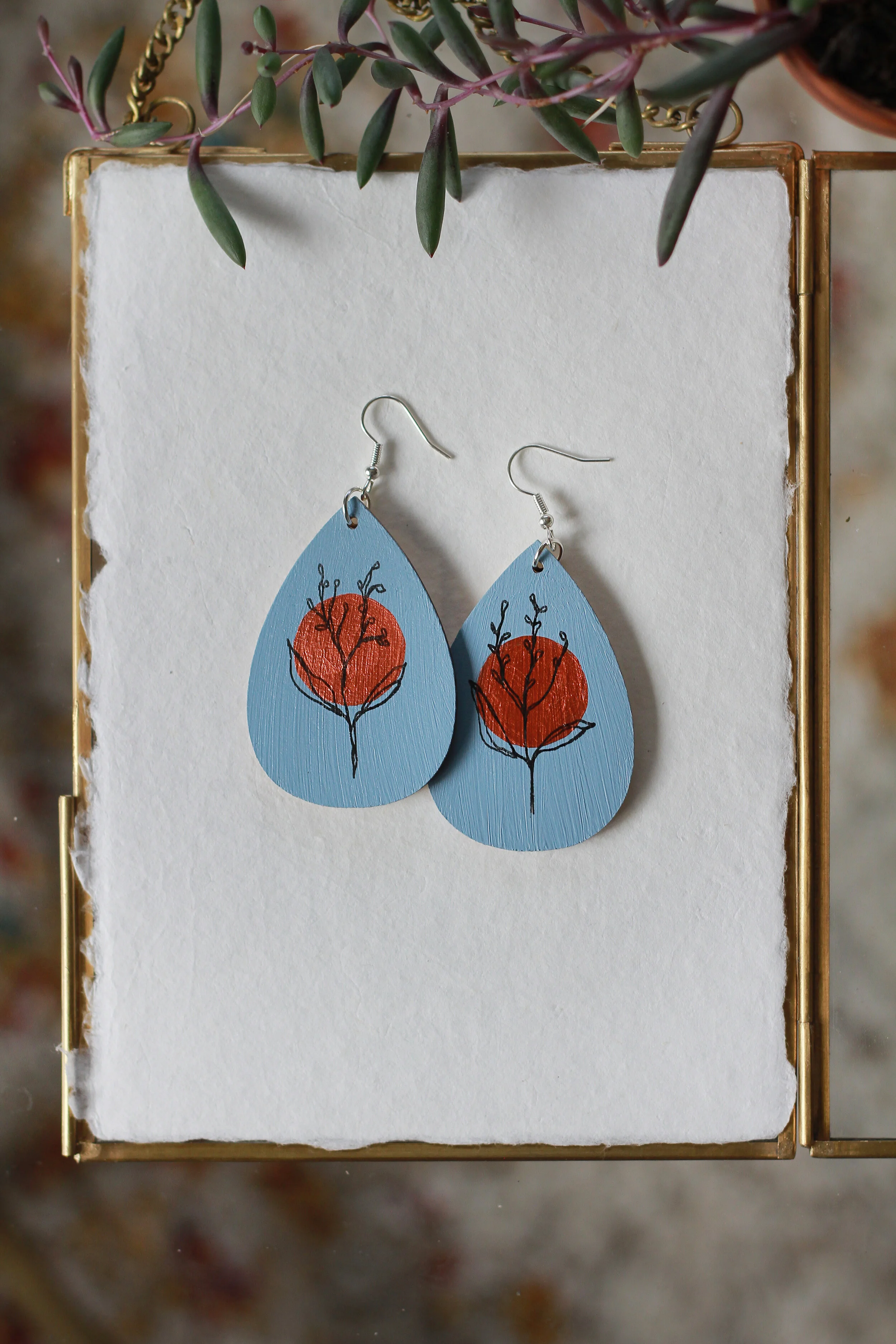 Pale Blue with a Copper Circle and a Contour Flower Earring