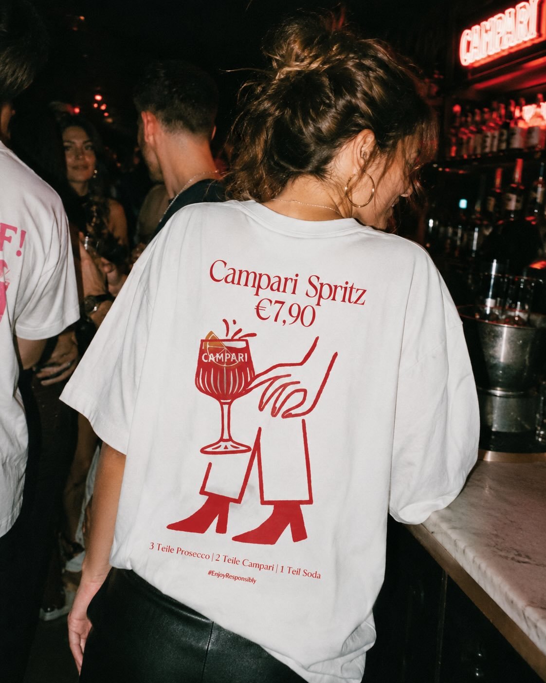 Promotion people actually wear: A Campari Spritz T-shirt designed as an alternative advertising medium. Made to travel through bars, parties and city nights long after the first drink is served.

Concept, Art Direction &amp; Design by me.
❤️&zwj;🔥