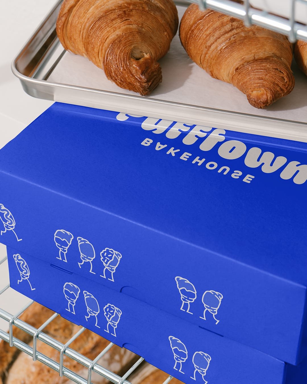 Good branding doesn&rsquo;t just make people look&mdash;it makes them 𝘭𝘪𝘯𝘦 𝘶𝘱. 🥐✨
 
 
Since launching their new identity, @pufftownbakehouse has turned a kitchen experiment into a full-blown Seattle obsession. Lines around the block. Sold-out 