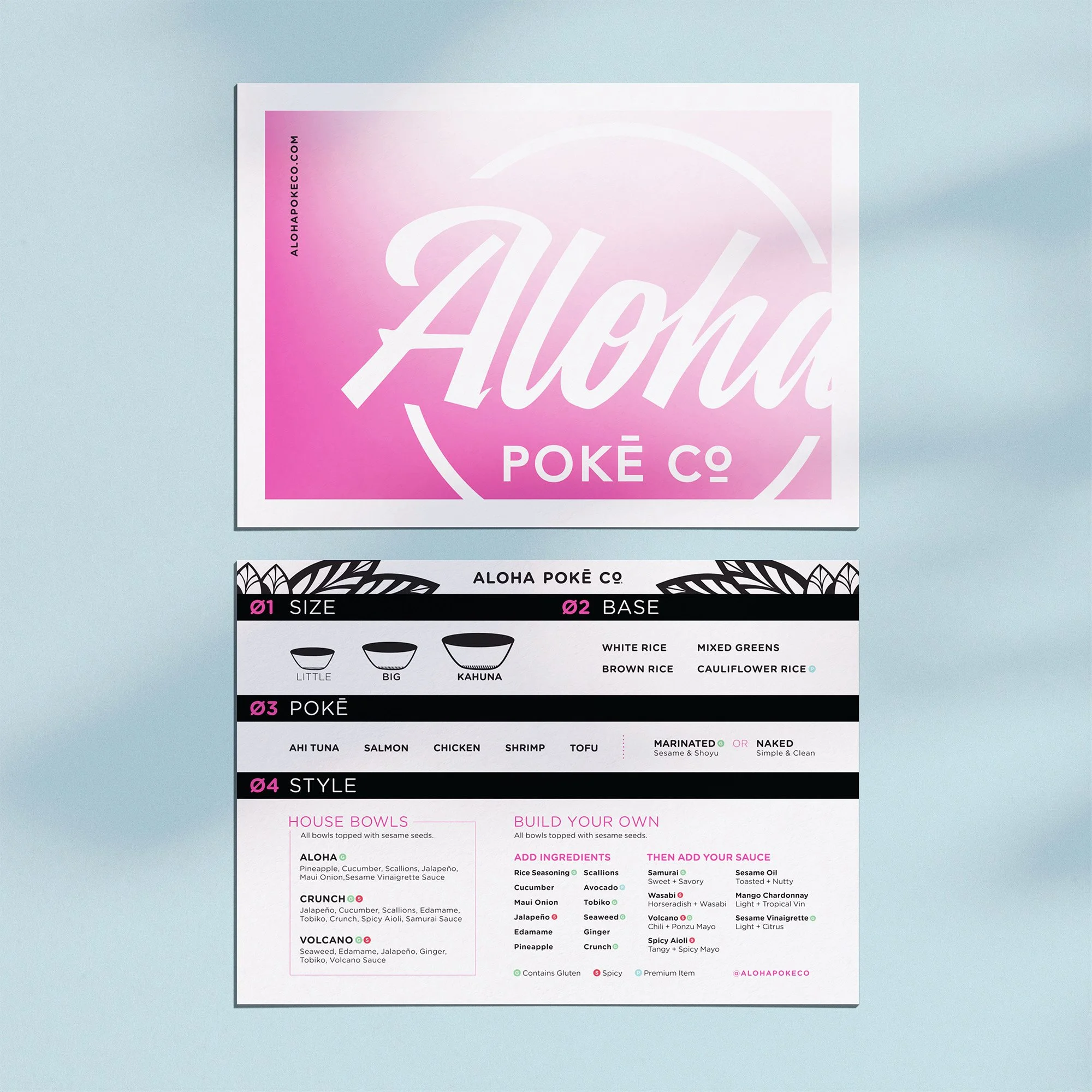 A menu for Aloha Poké Co displayed on a light blue surface. Themenu has different sections including size options, base options with rice types, poké options with fish and protein choices, style options for house bowls or build your own, and various