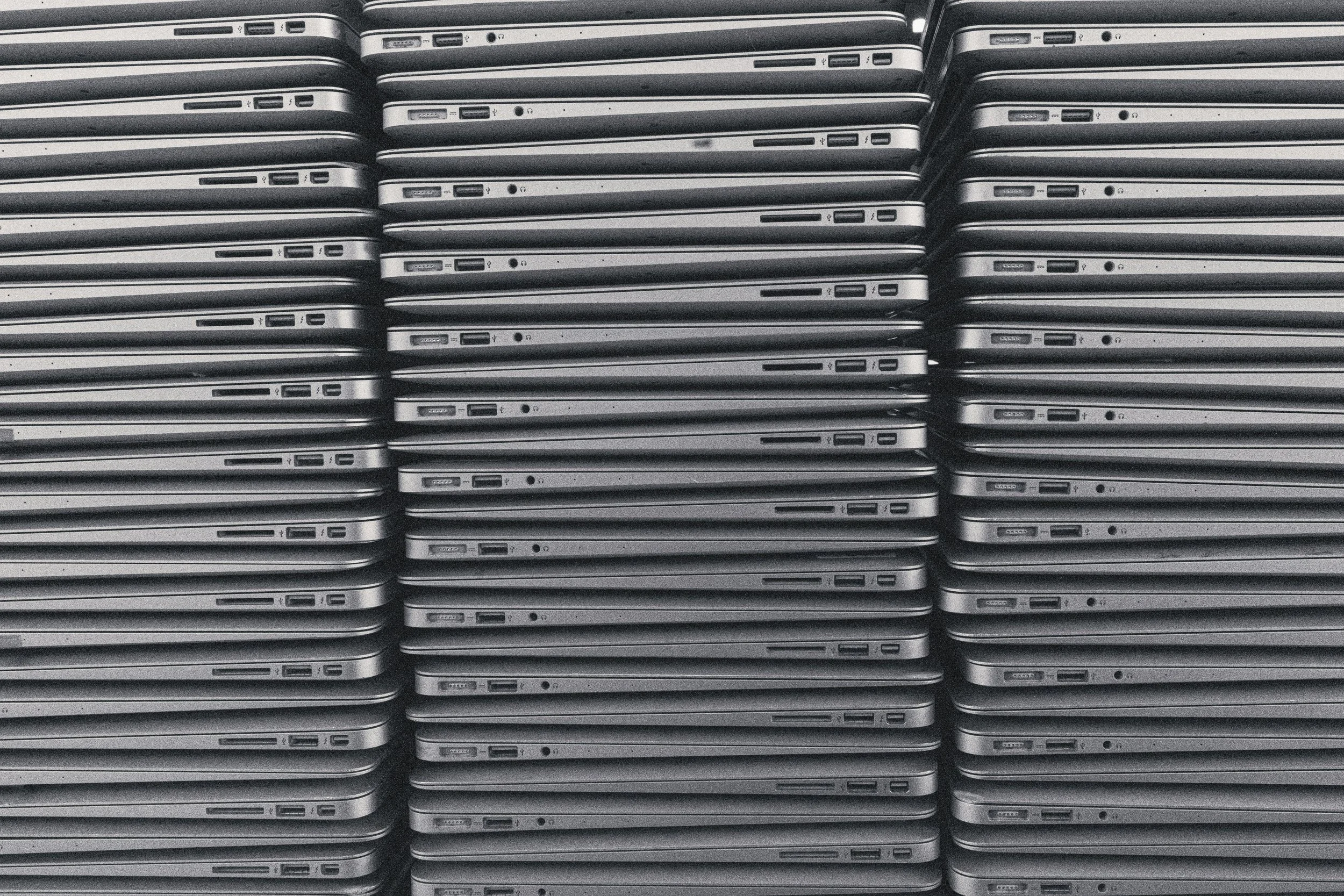 Stacked Macbook Airs.jpg