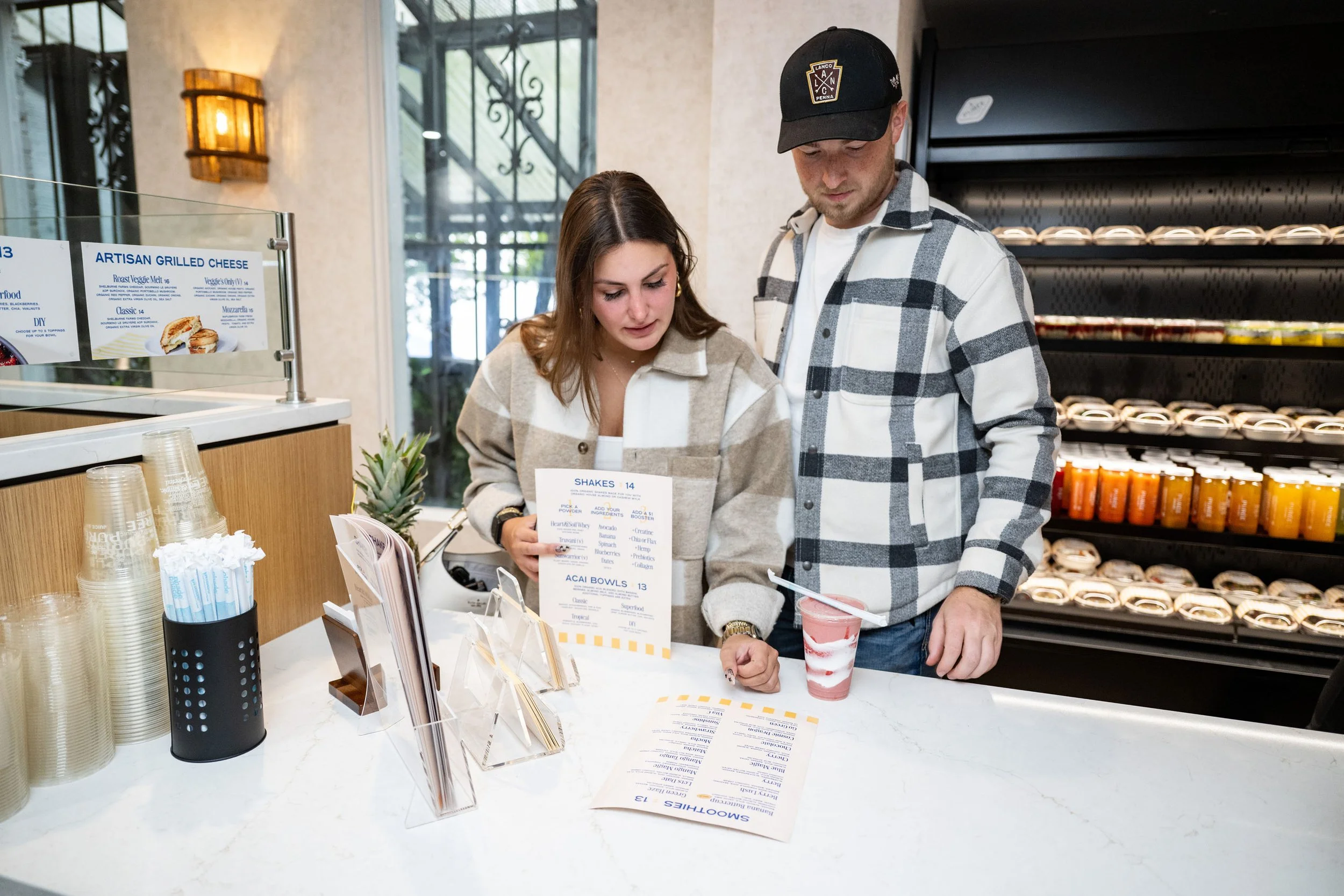 puree-juice-bar-georgetown-opening-guests-reading-menu-counter-088.jpg