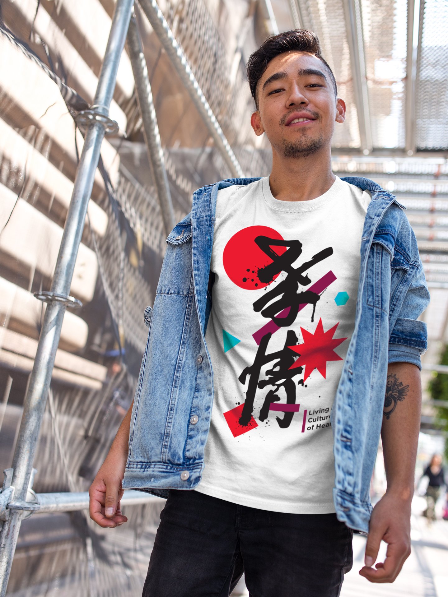 asian-man-wearing-a-tshirt-template-while-on-a-bridge-a17798_pswm.jpg
