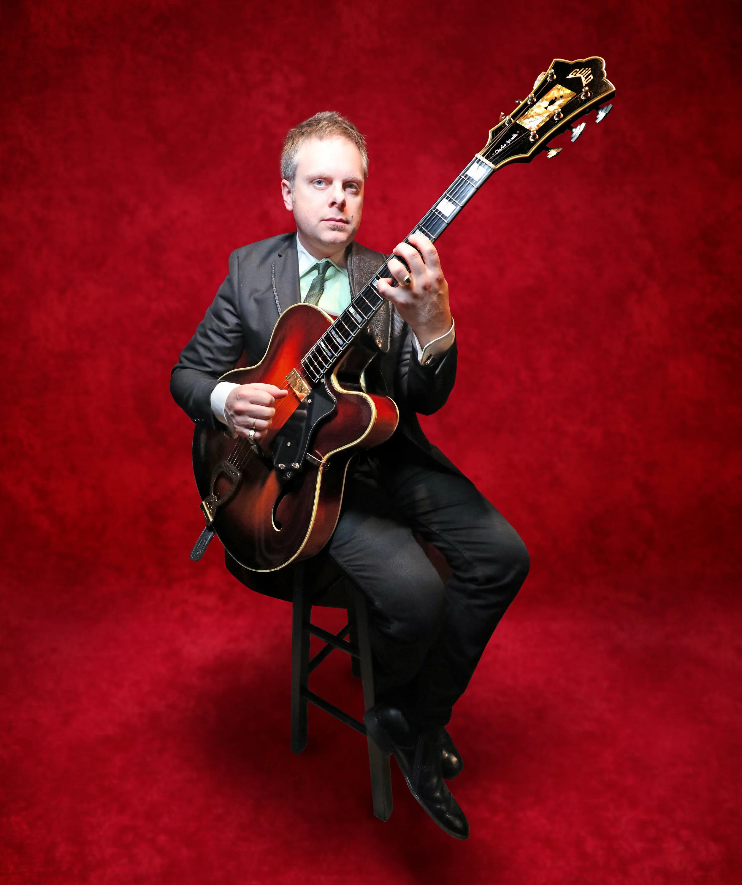 Classic Guitar cover headshot red copy 2.jpeg