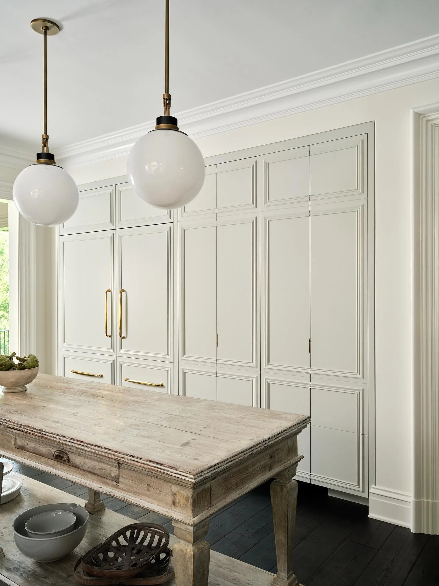 Looking for a place to stash the Halloween candy? The hidden pantry in our Rittenhouse apartment offers an out of the way space that kitchen clutter. 
.
#kitchendesıgn #pantryorganization #pantry #interiordesign