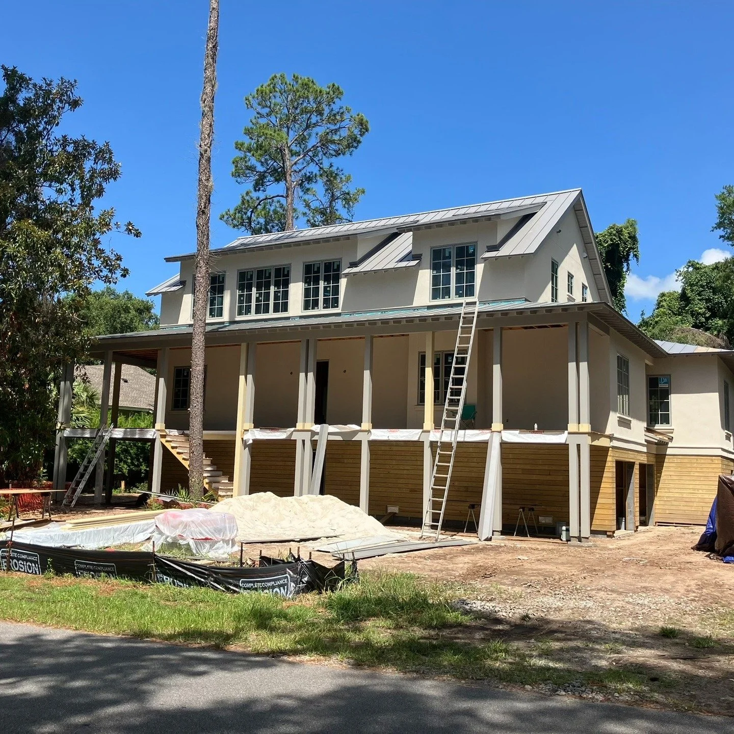 Our take on classic Lowcountry architecture in Hilton Head Island, SC coming into shape. 

Raised well above the flood plane and characterized by beautiful wrap-around porchs, shed dormers and large windows the Lowcountry design elements provide shad