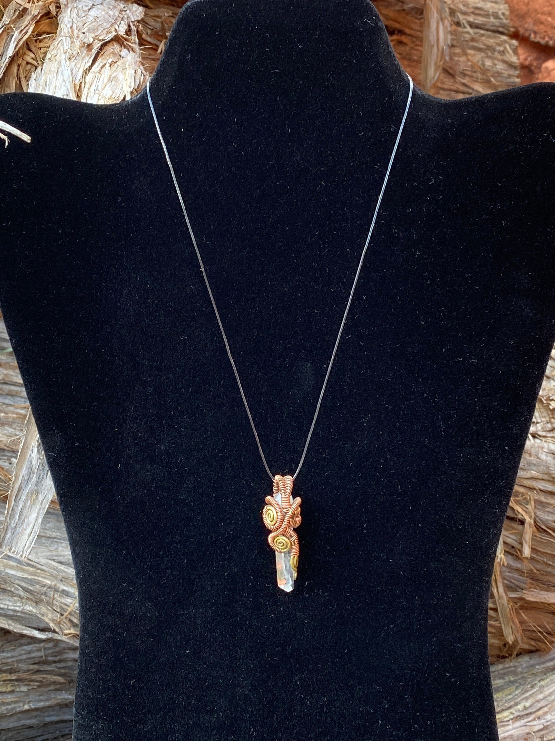Handmade Pendant by Qory in Peru in the Sacred Valley. Woven with Copper & Brass with a