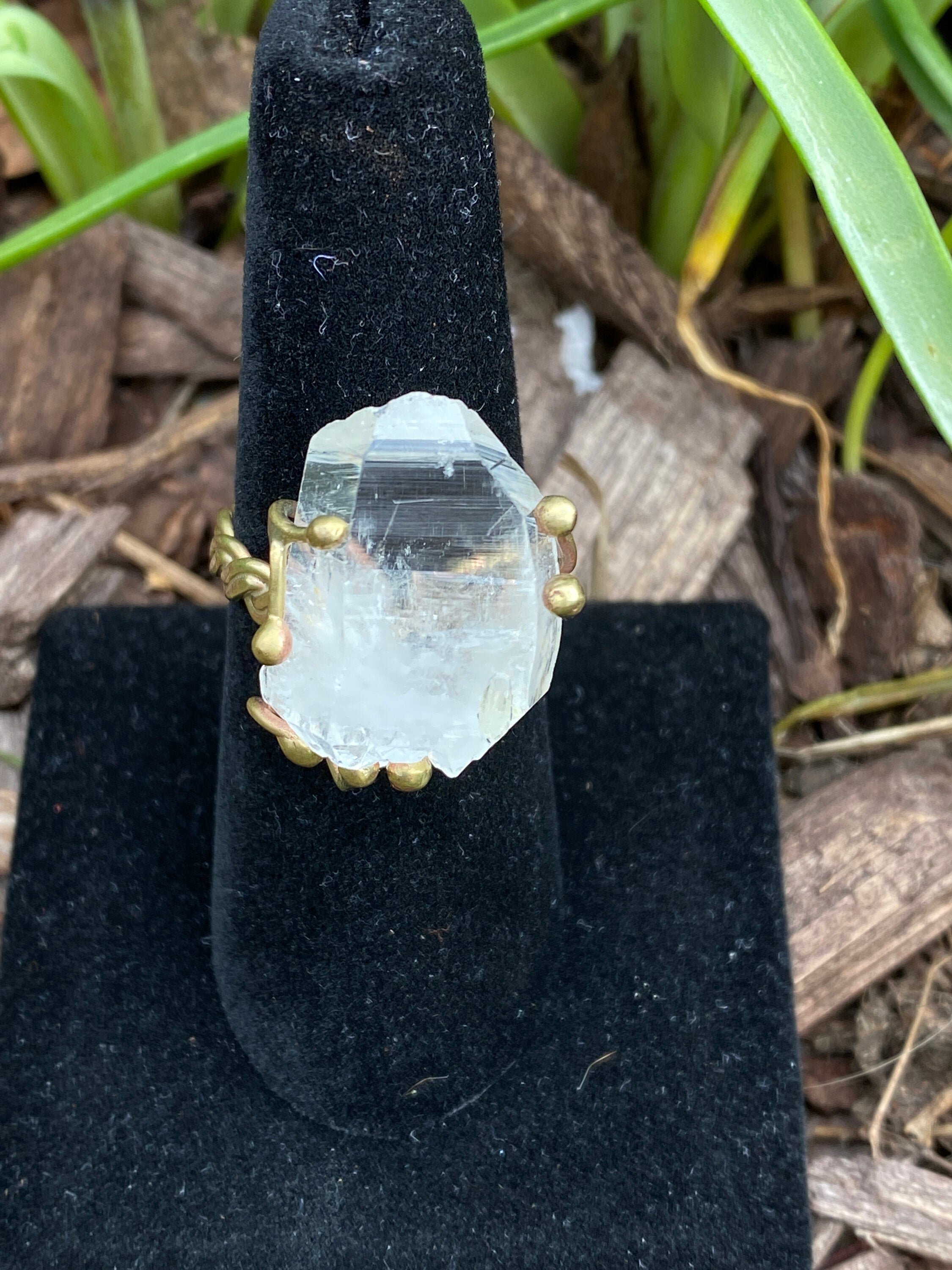 Handmade Ring by Qory in Peru in the Sacred Valley. Woven with Brass & clear Quartz.