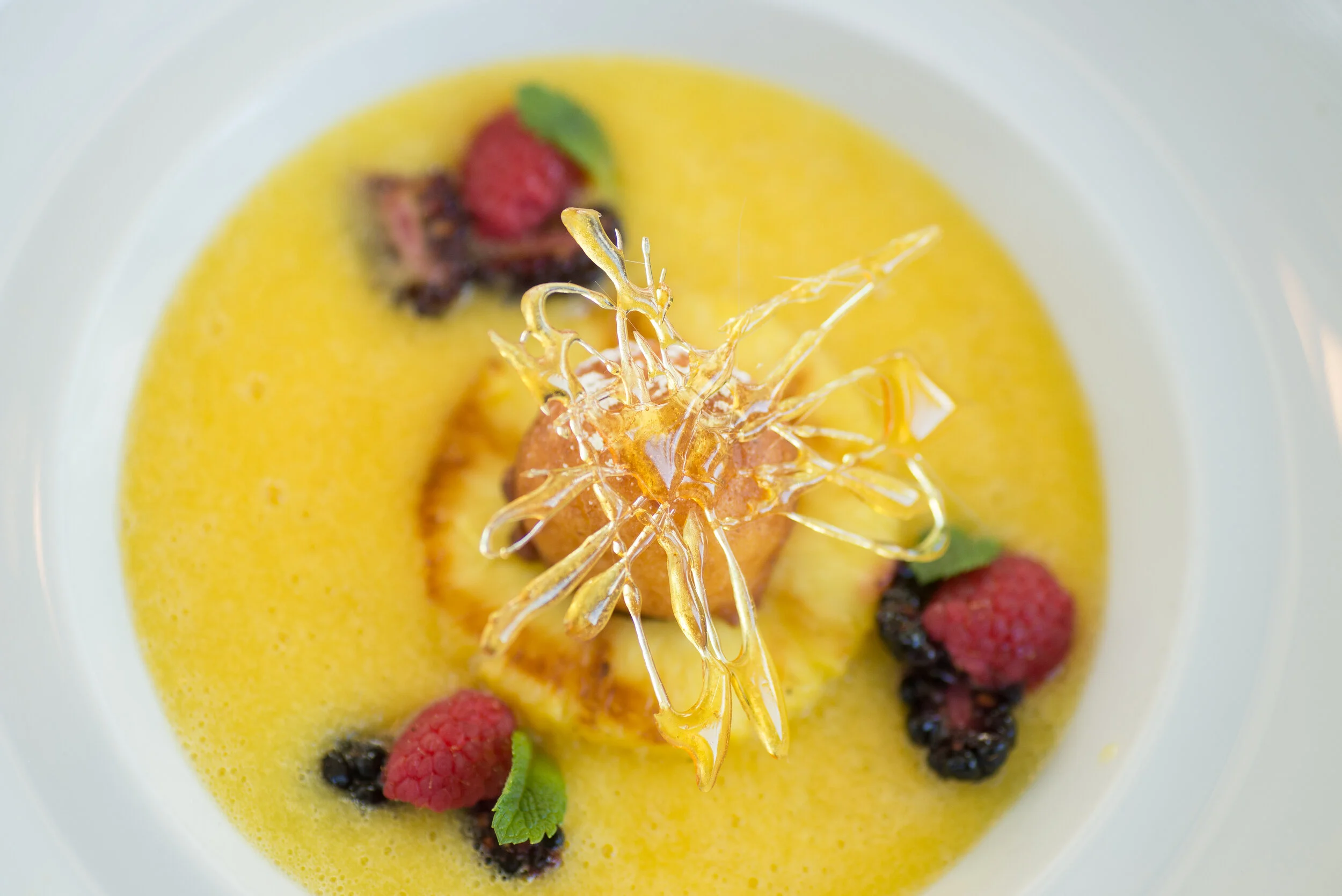 mango soup with berries vegan.jpg