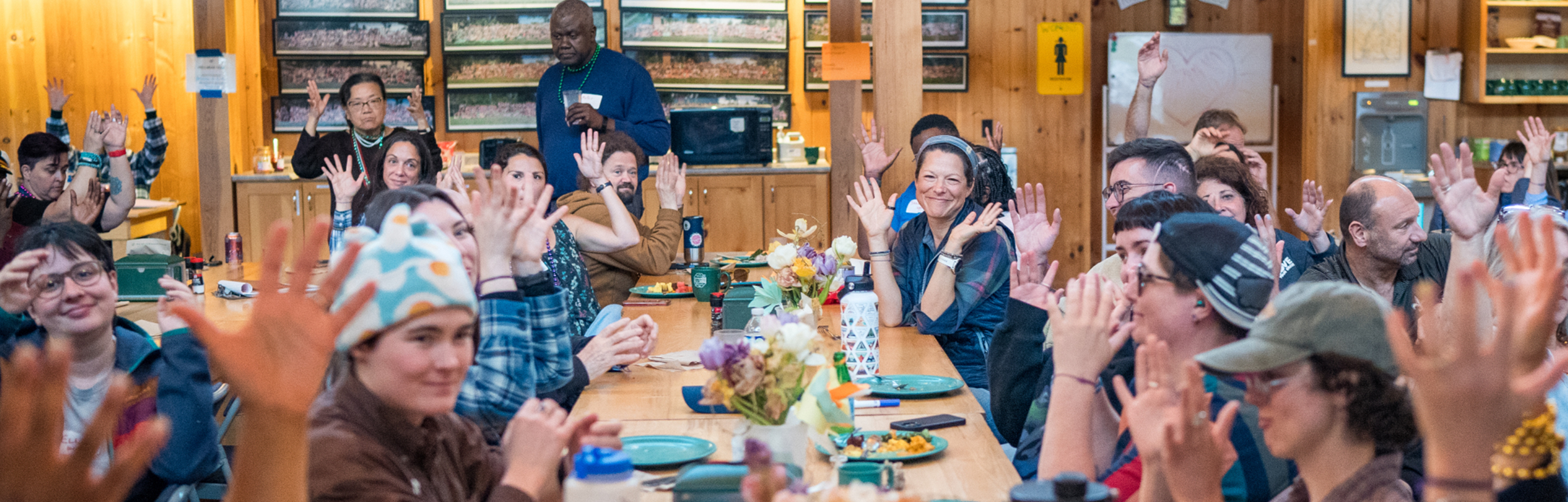 people gathered for a loveyourbrain retreat meal