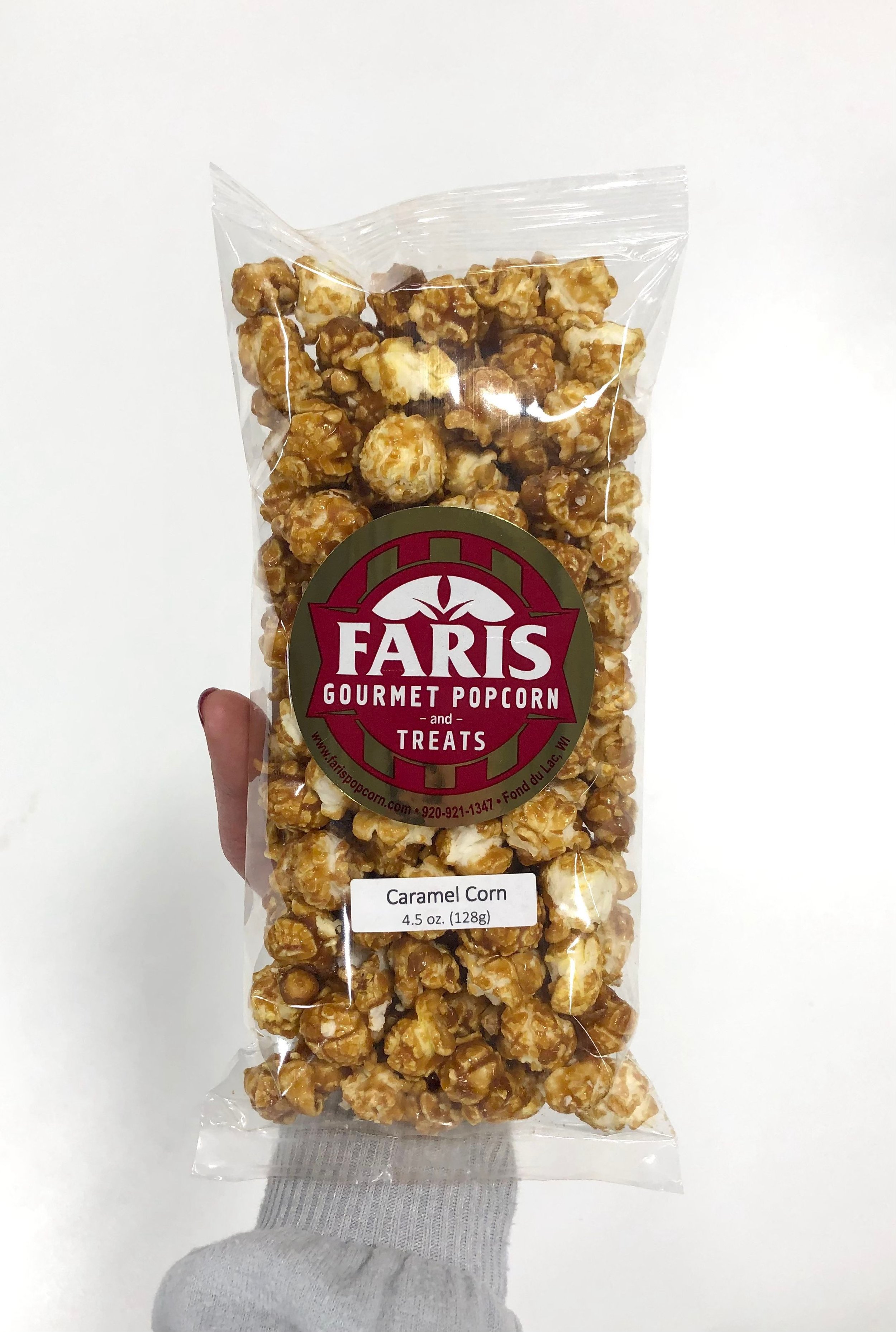 snack xl bag holding caramel corn.jpeg