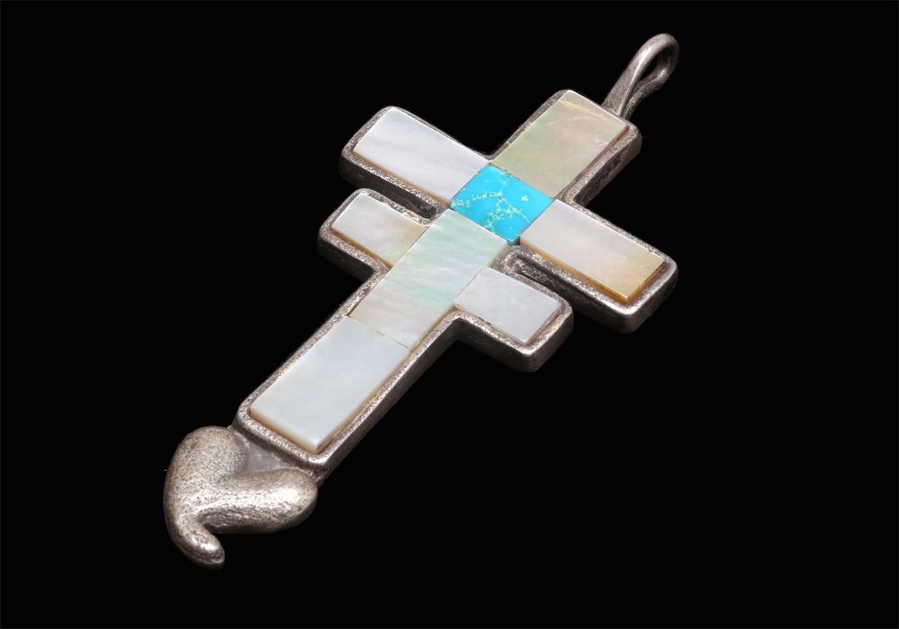   Double Cross Pendant with heart  by Anthony Lovato, son of Mary Coriz Lovato, tufa cast silver, inlaid with mother of pearl and turquoise. 