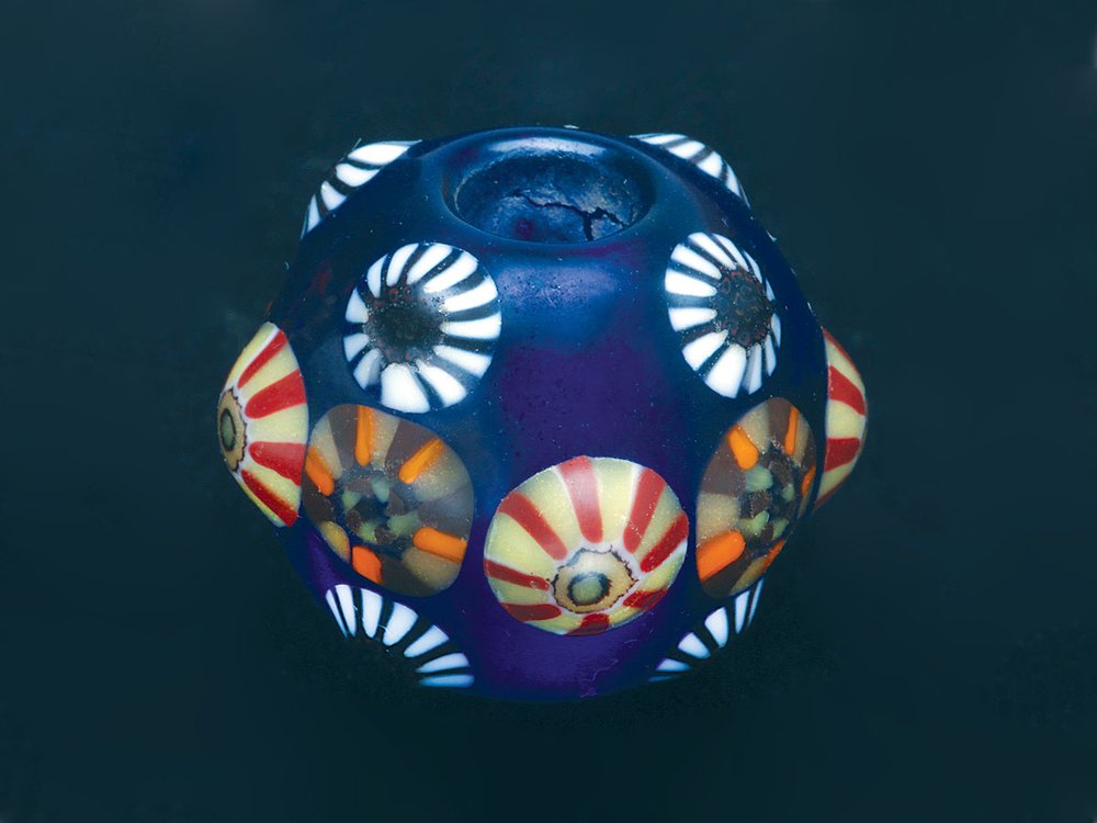  INTERPRETATION OF WARRING STATES BEAD BY KYOYU ASAO, early Japanese pioneer glass master (Ukai 1980), 2.4 centimeter diameter, gifted 1977. Self-taught in glass and metal, the late Asao made all his precise components and was also an expert on lapid