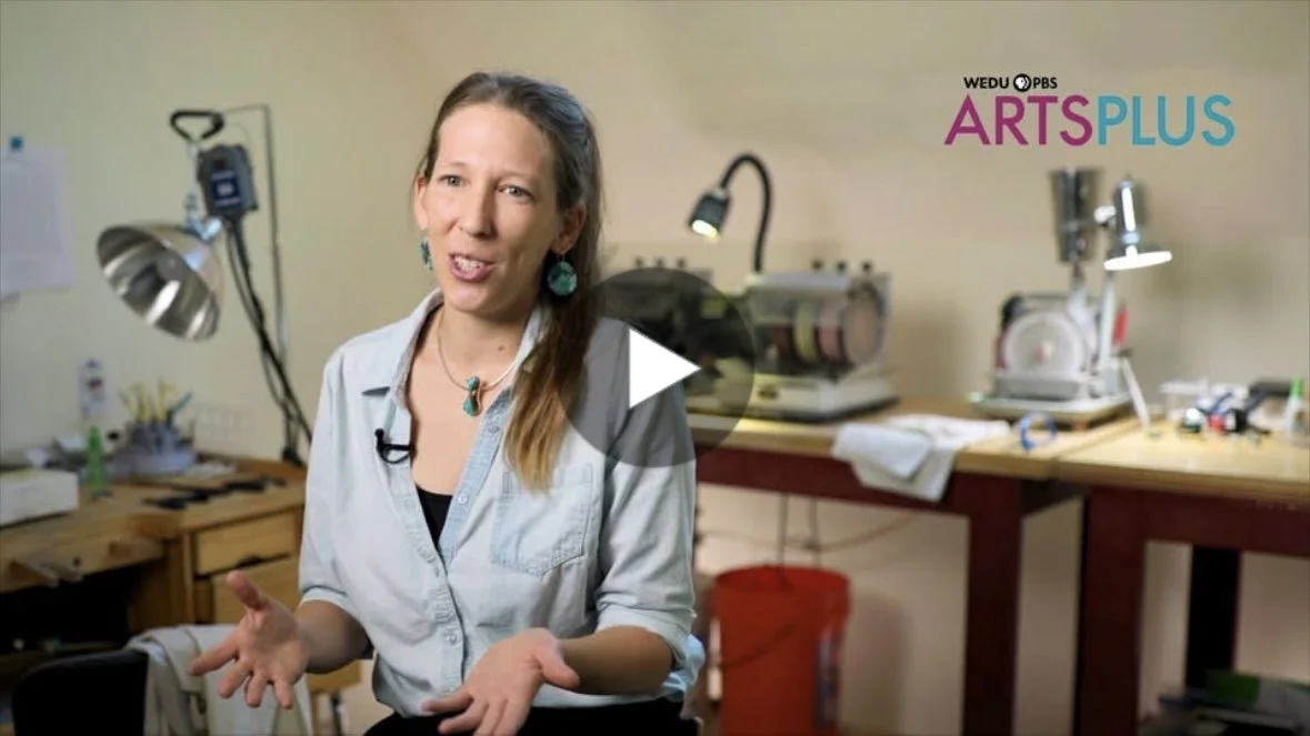 Picture of Caitlin Albritton in her jewelry studio interviewed for WEDU Arts Plus segment