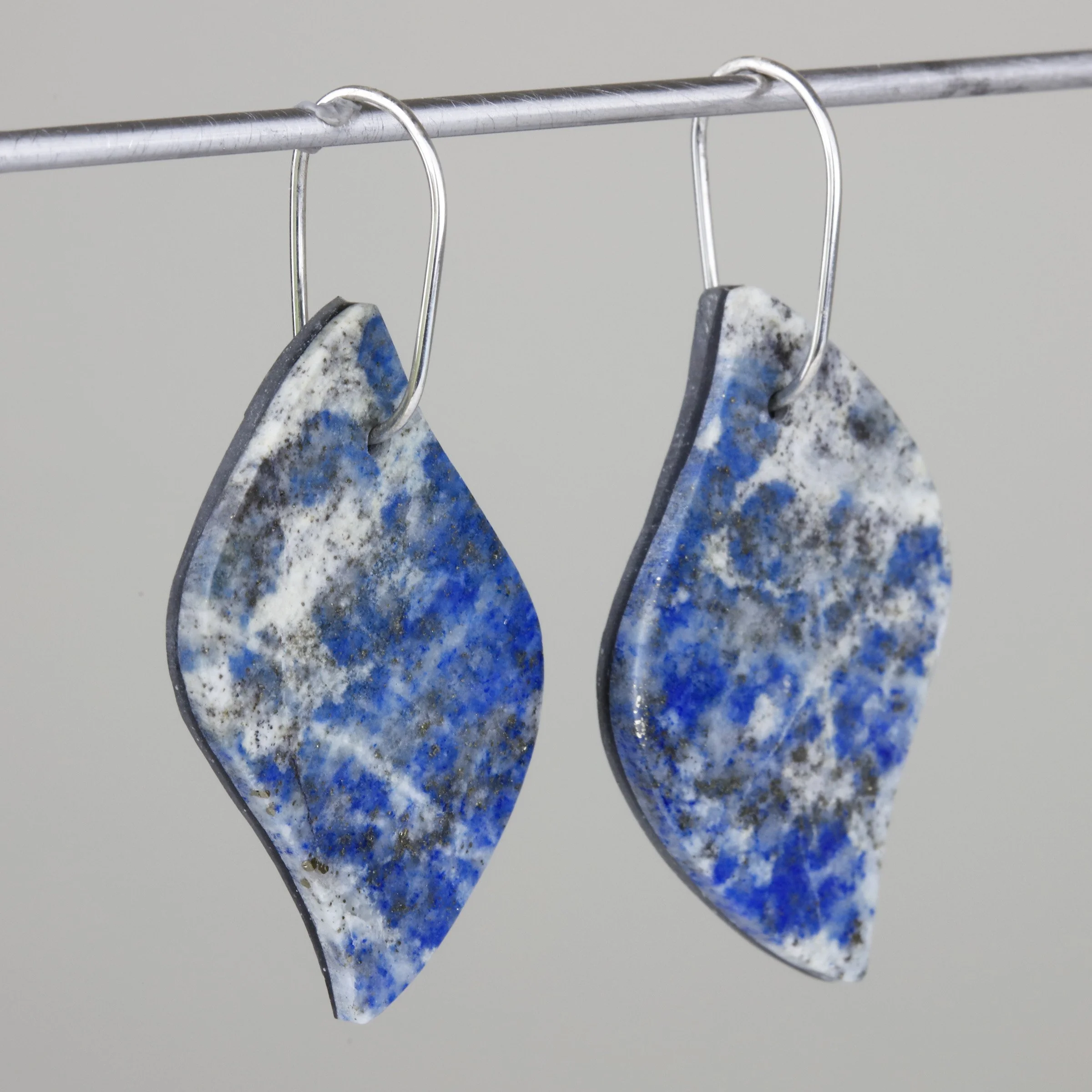 Natural lapis lazuli drop earrings with sterling silver ear wires; side view of hand-cut earrings