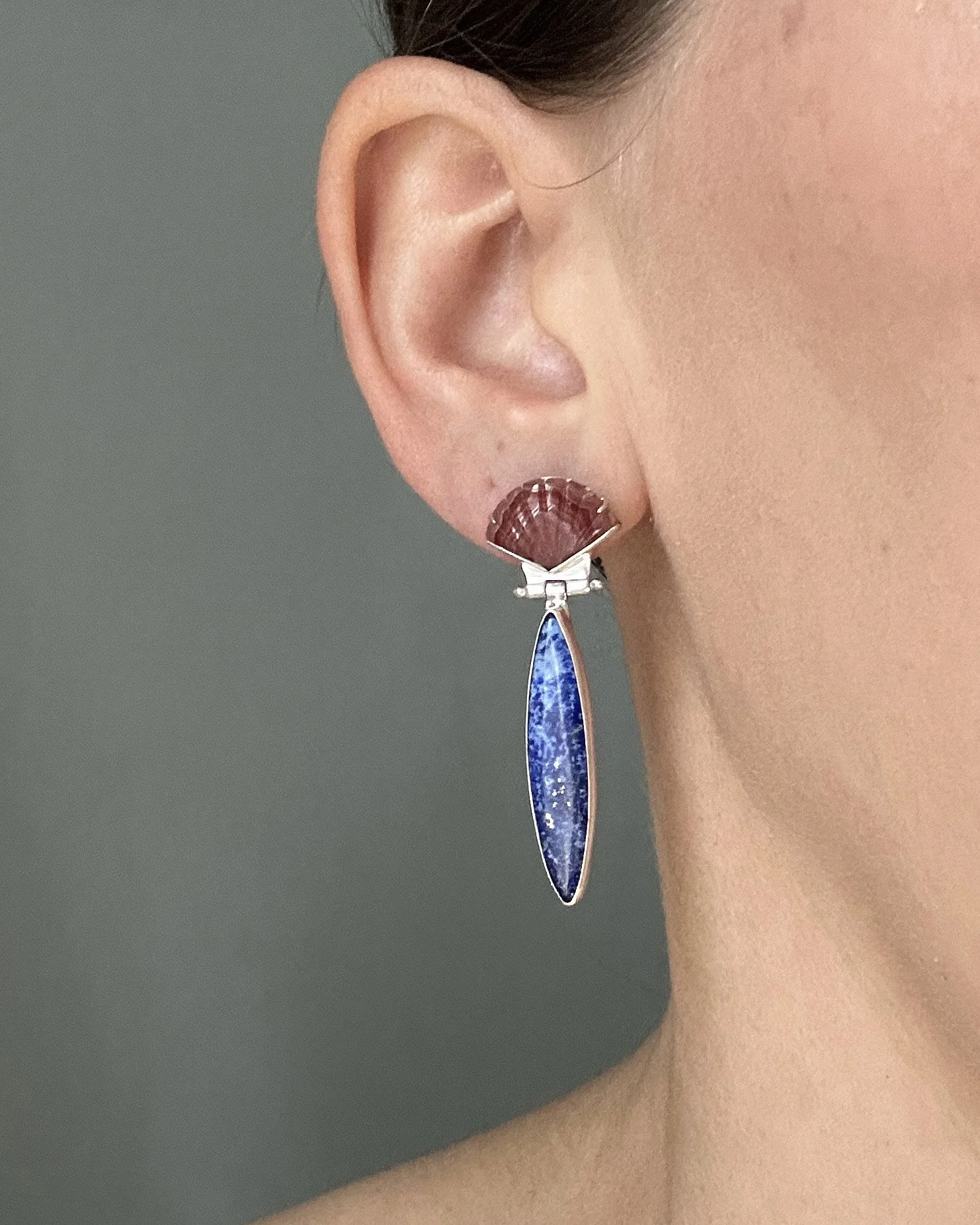 Carved natural stone drop earrings, modeled by the jewelry artist Caitlin Albritton